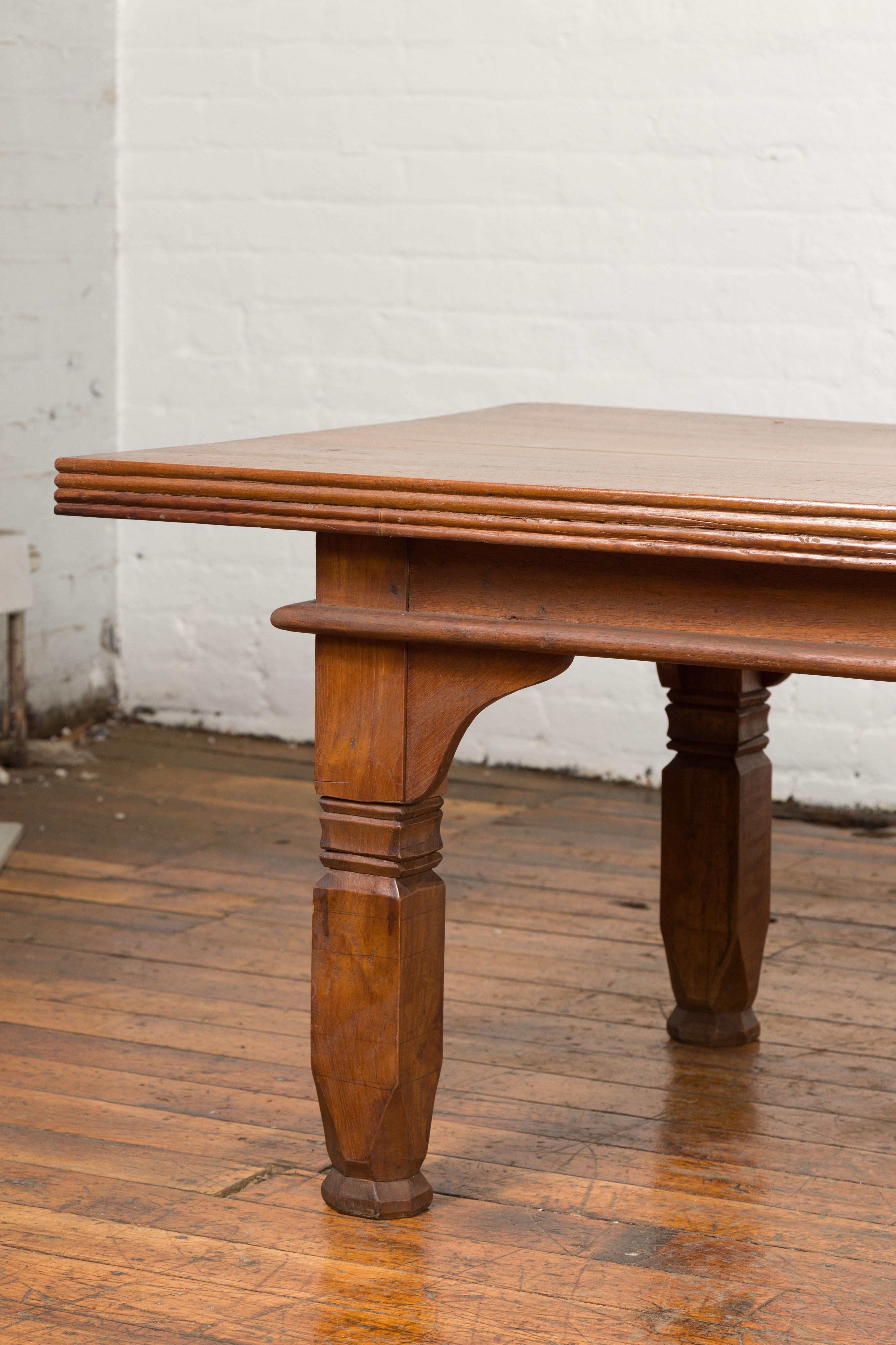 Oversized 19th Century Indonesian Coffee Table with Reeded Edge and Carved Legs For Sale 1