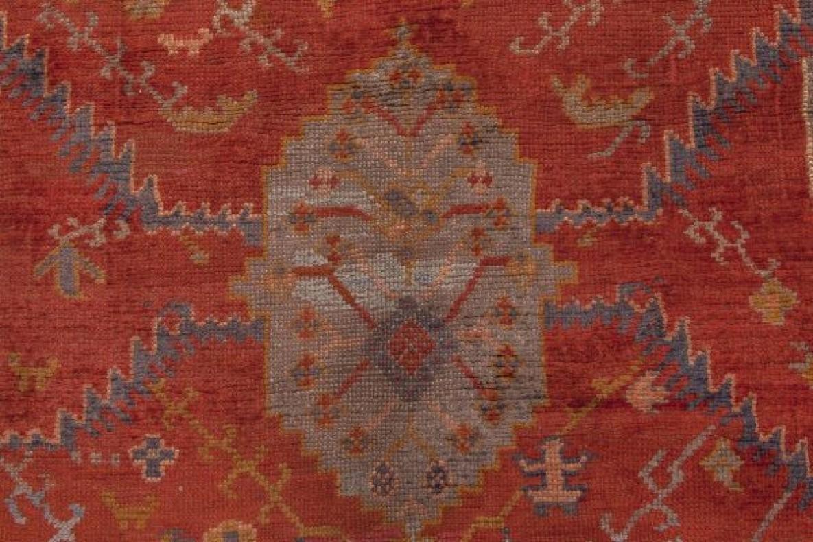 Oversized 19th century Turkish Oushak red handwoven wool rug
Size: 15'0