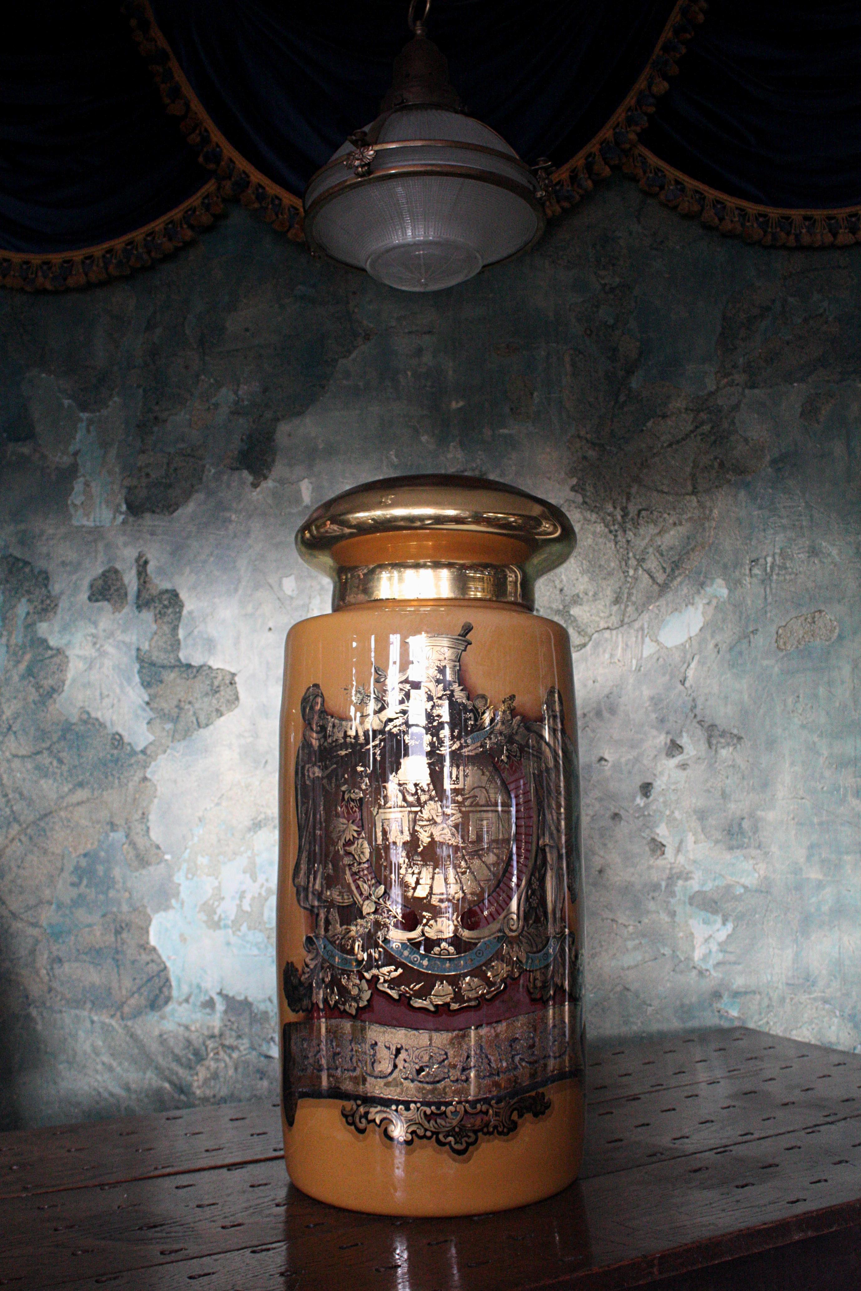 Here we have wonderful decorative late 19th century pharmacist hand blown display/dispensing glass jar, of large proportions.

The jar is reverse painted by hand, with a orange ground and gilt detailing, there is some loss to the paintwork, but