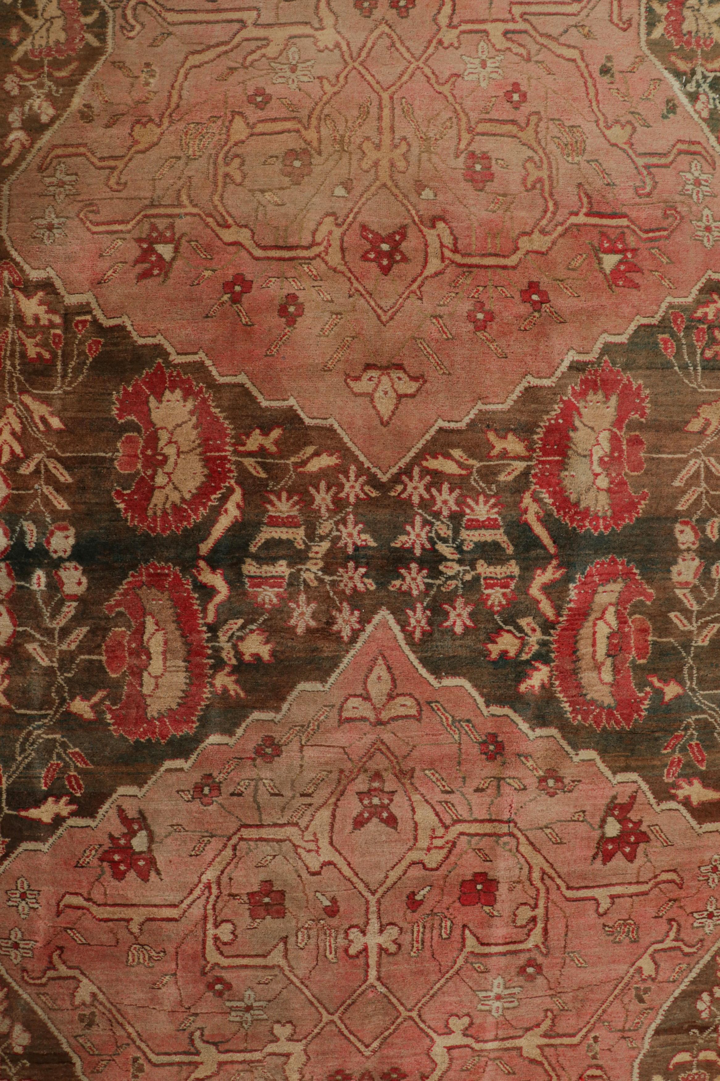 Wool Oversized Antique Agra Rug in Pink and Brown with Floral Patterns  Rug & Kilim For Sale
