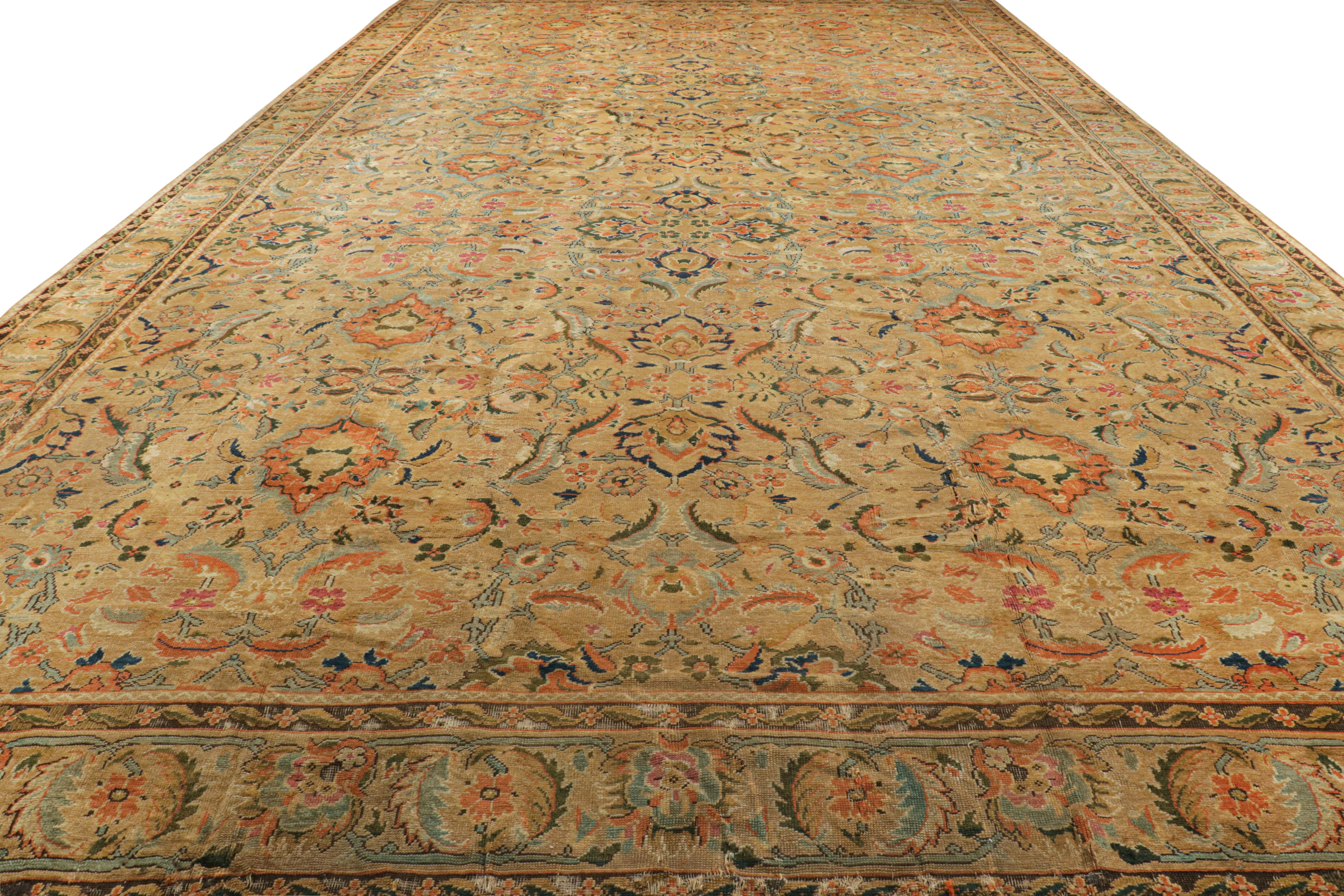 Oversized Antique Axminster Rug in Camel with Floral Patterns In Good Condition For Sale In Long Island City, NY