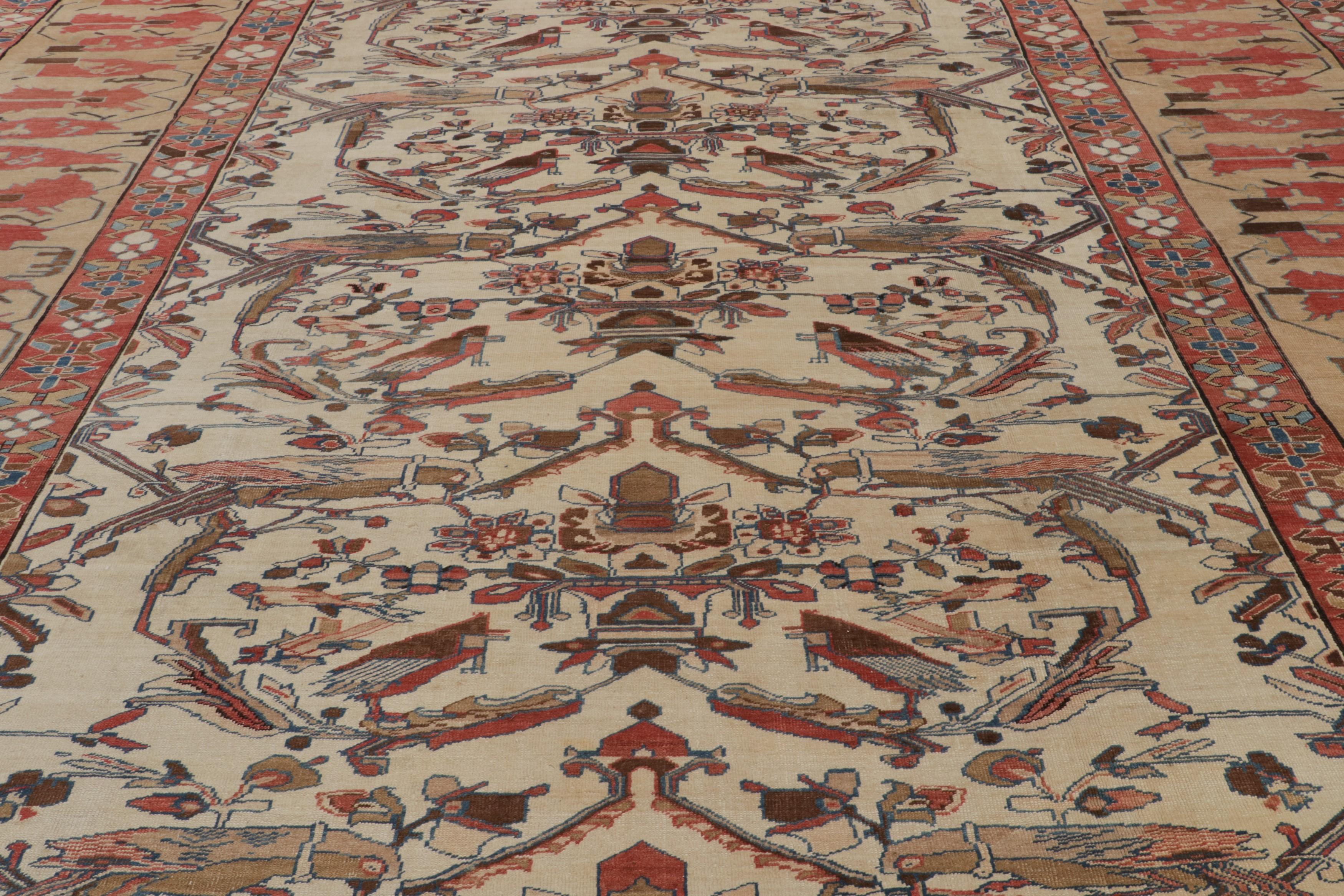 Hand-knotted in wool, an antique 13x18 oversized Bakshaish rug circa 1920-1930 - making a grand new entry to our antique selections.

On the Design:

This rug is rare in both size and pattern. Keen eyes will note beige-brown bird pictorials in the