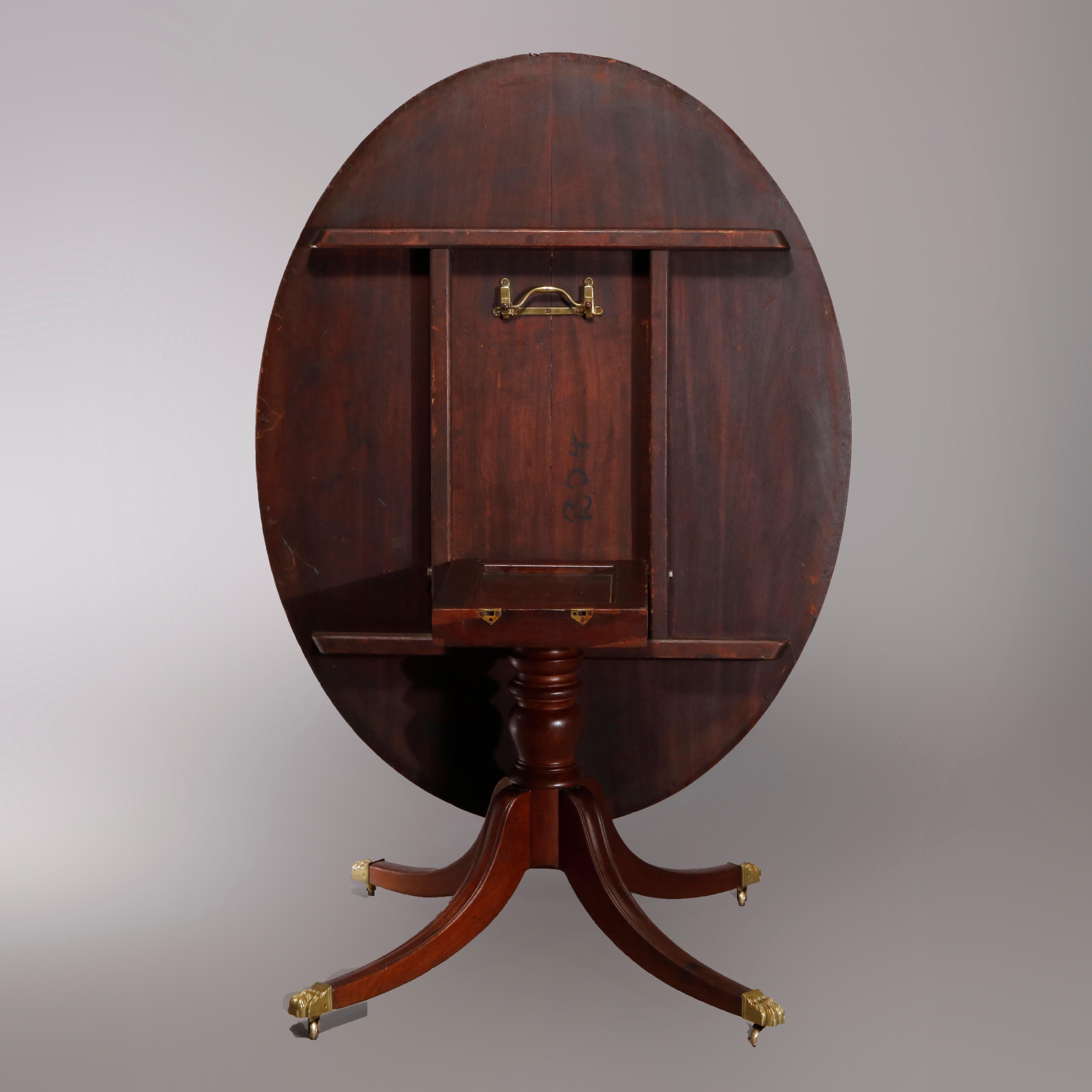 Carved Oversized Antique English Regency Mahogany Tilt-Top Table, circa 1830