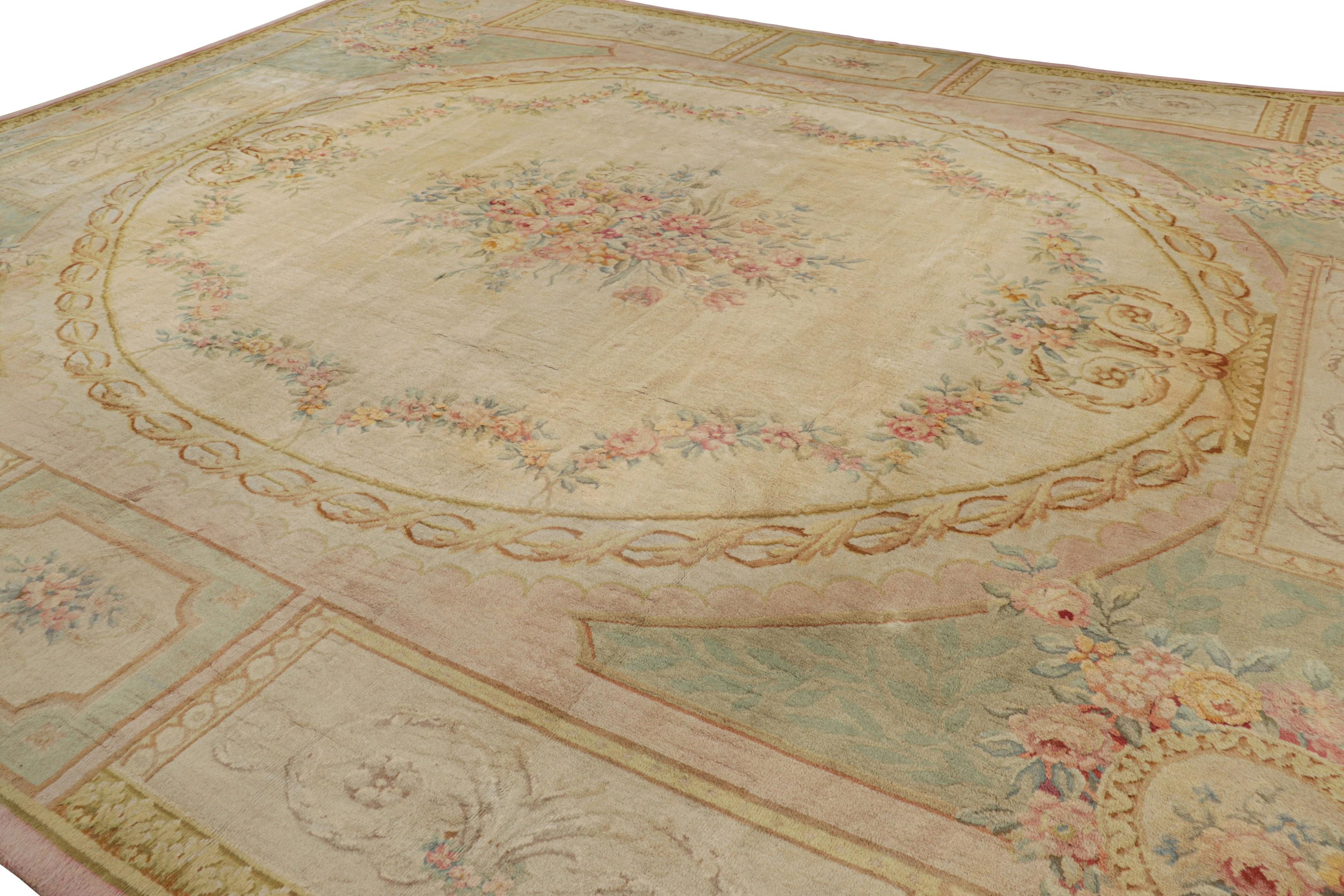 Hand-knotted in wool and originating in France circa 1880-1890, this 16x21 Antique French Savonnerie rug is a rare masterpiece from Rug & Kilim’s European rug collection. 

On the Design: 

This regal piece hosts a large-scale medallion in the
