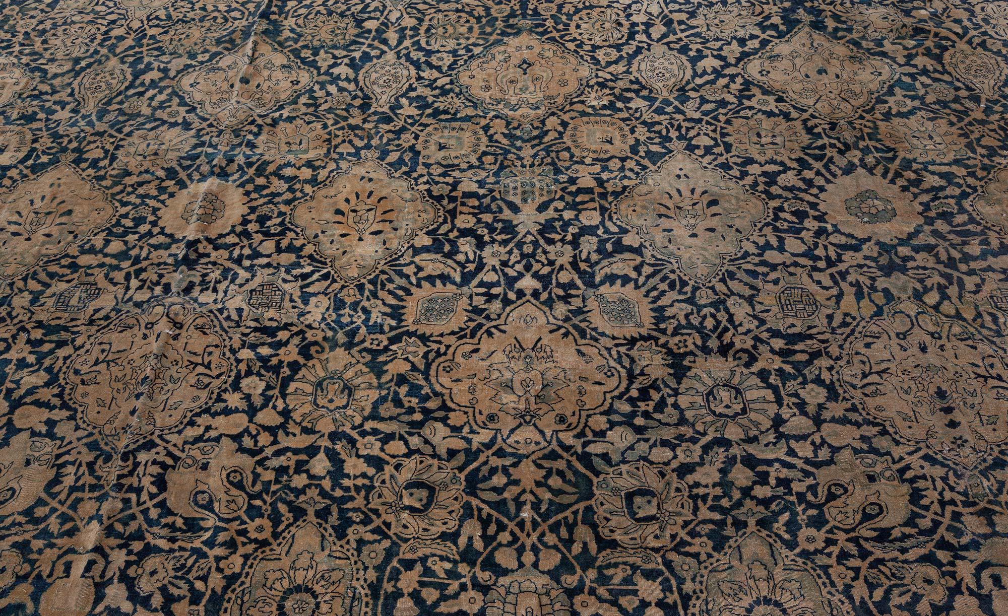 Oversized antique Indian botanic handmade wool rug
Size: 16'5