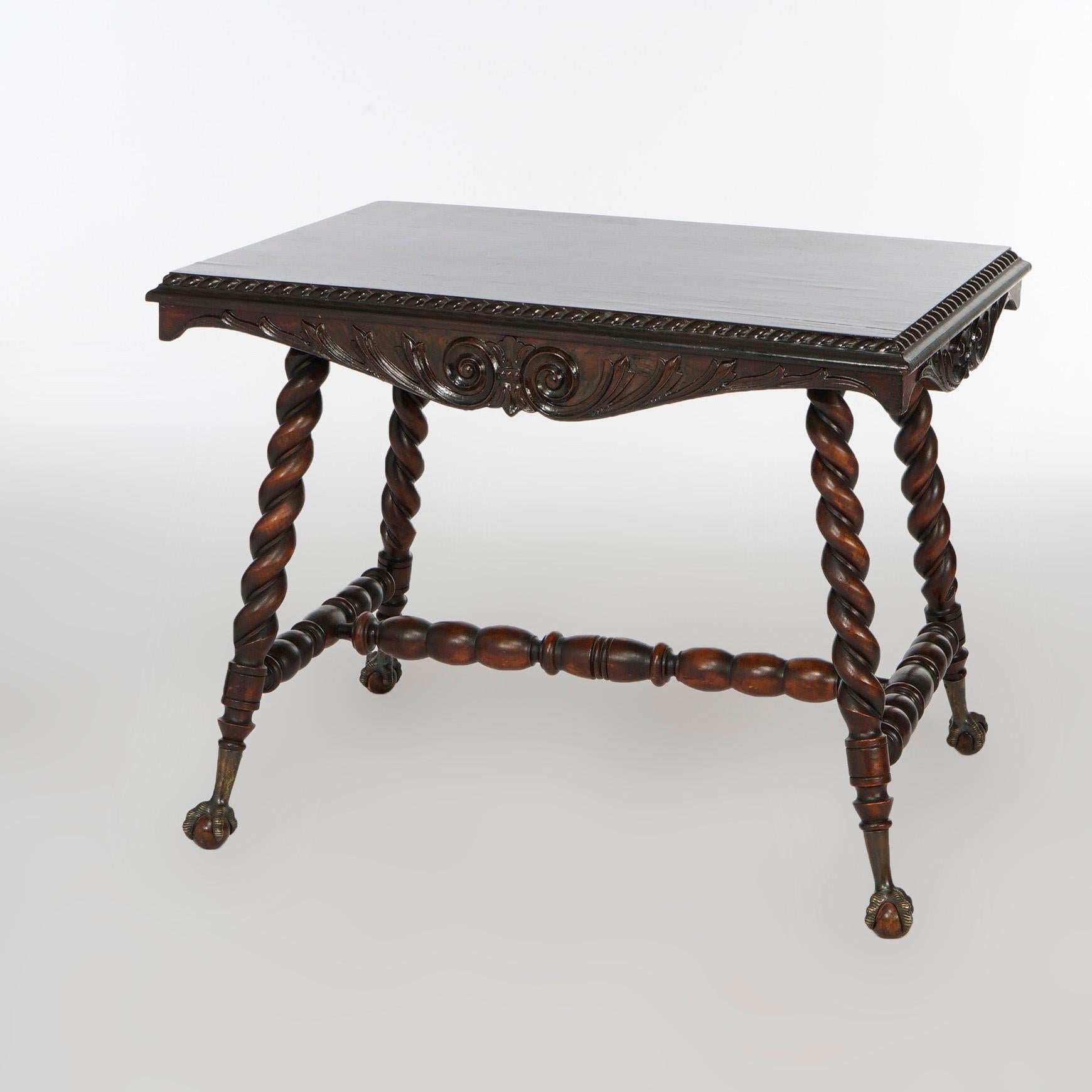Un grand lampadaire antique de la manière de Hunzinger offre une construction en acajou avec un sommet ayant une garniture de corde torsadée sur une base évasée avec des pieds sculptés en forme de torsade d'orge se terminant par des griffes et des