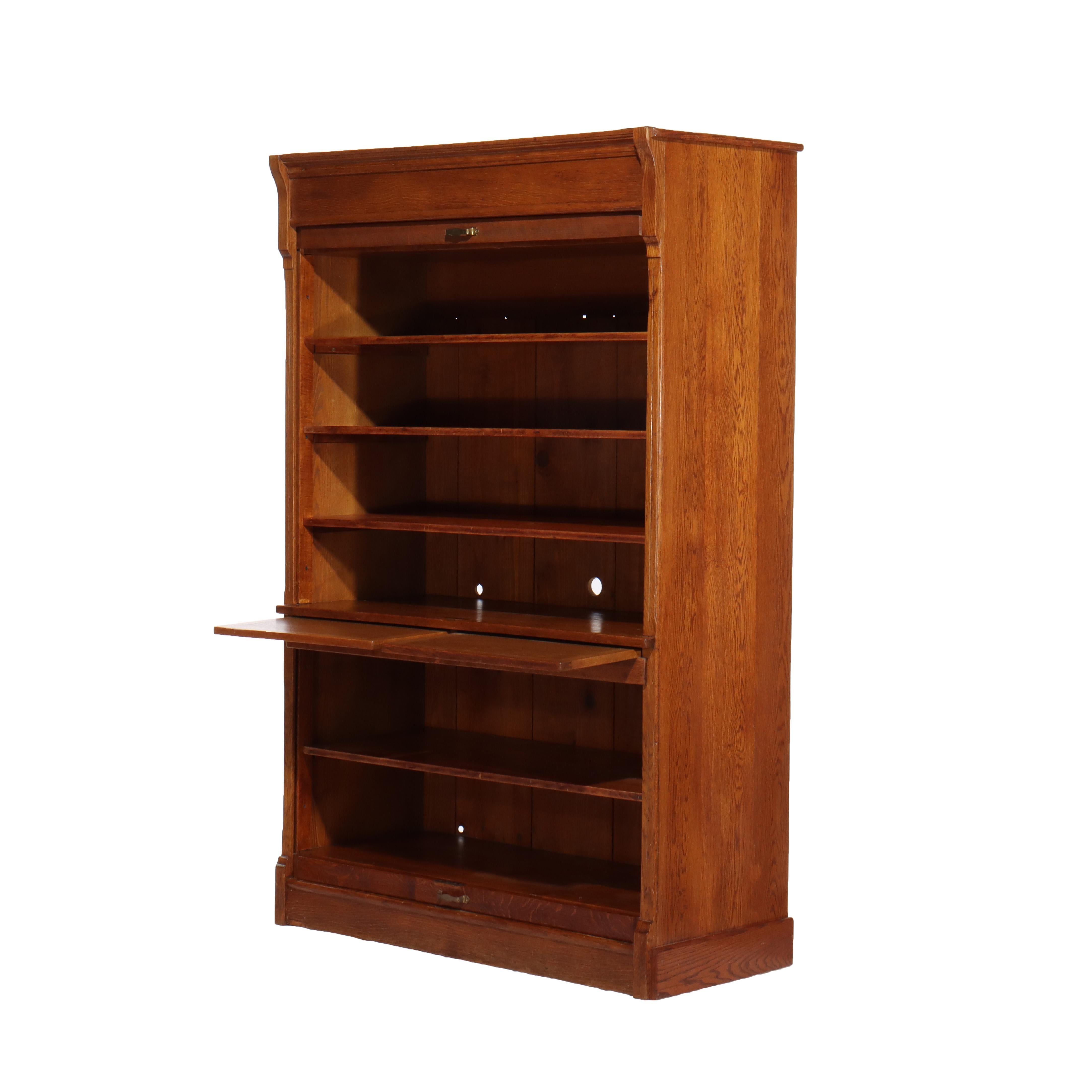 ***Reduced In-House Delivery Rates - Click on “Ask Seller” to Request a Quote***
Oversized Antique Oak Roll Front Bookcase C1920
Measures - 75.25