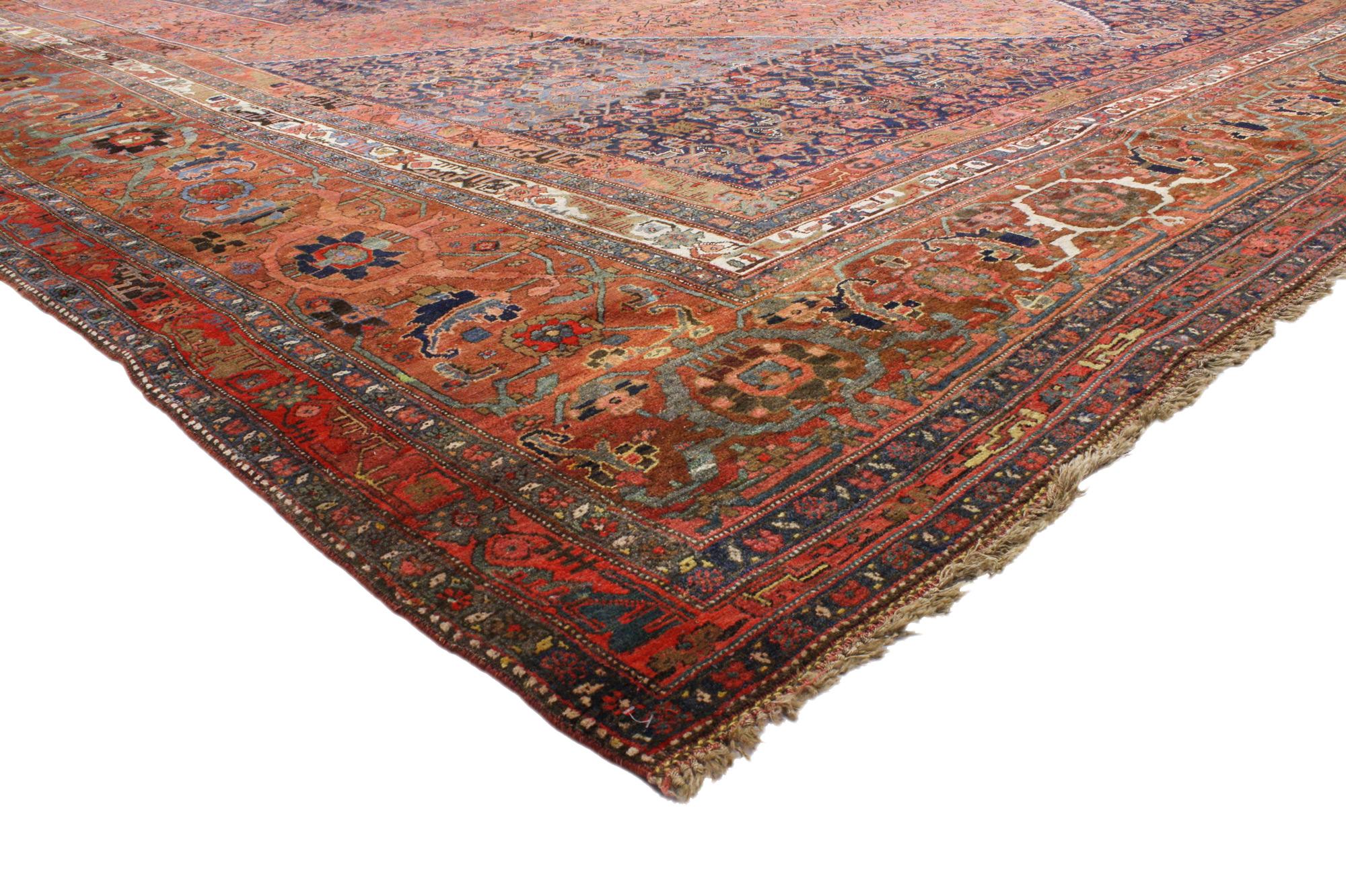 73125 Oversized Antique Persian Bijar Rug, 15'01 x 26'01. 
Cleverly composed and distinctively well-balanced, this hand knotted wool oversized antique Persian Bijar rug will take on a curated lived-in look that feels timeless while imparting a sense