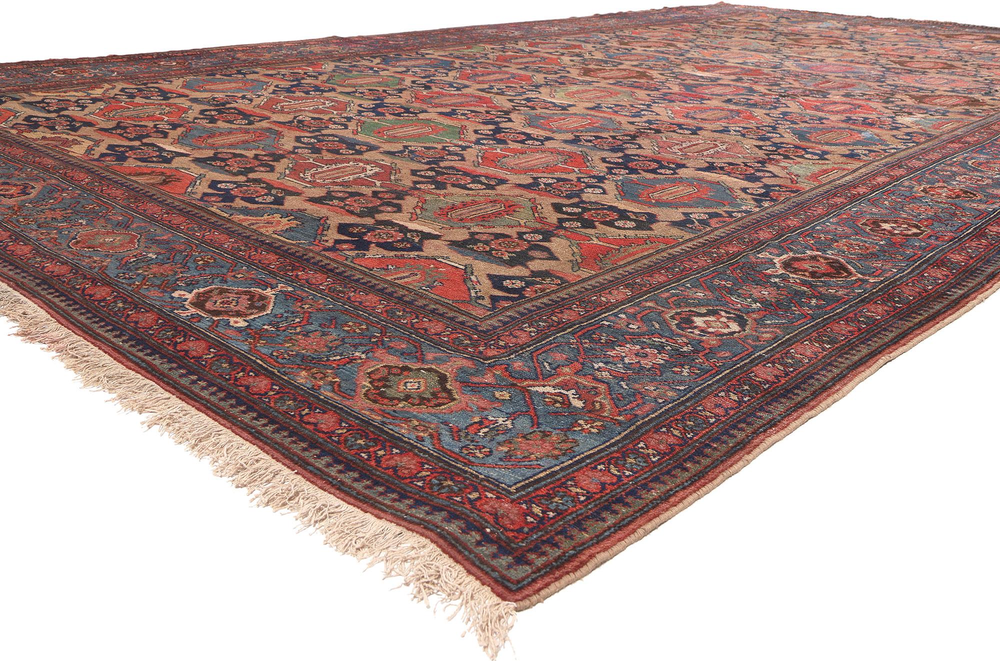 78334 Antique Persian Hamadan Rug, 10'11 x 19'04. Gaze upon the opulence of this oversized antique Persian Hamadan rug, a masterpiece that seamlessly blends tribal enchantment with the commanding Bibikabad design, showcasing beguiling tribal motifs.