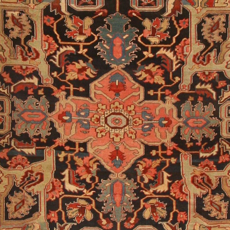 Beautiful geometric design antique oversize Persian Heriz Serapi rug, country of origin: Persia, date circa late 19th century, size: 10 ft. 10 in x 20 ft. 8 in (3.3 m x 6.3 m)

A grand medallion design spewing palmette vinescrolls and finials
