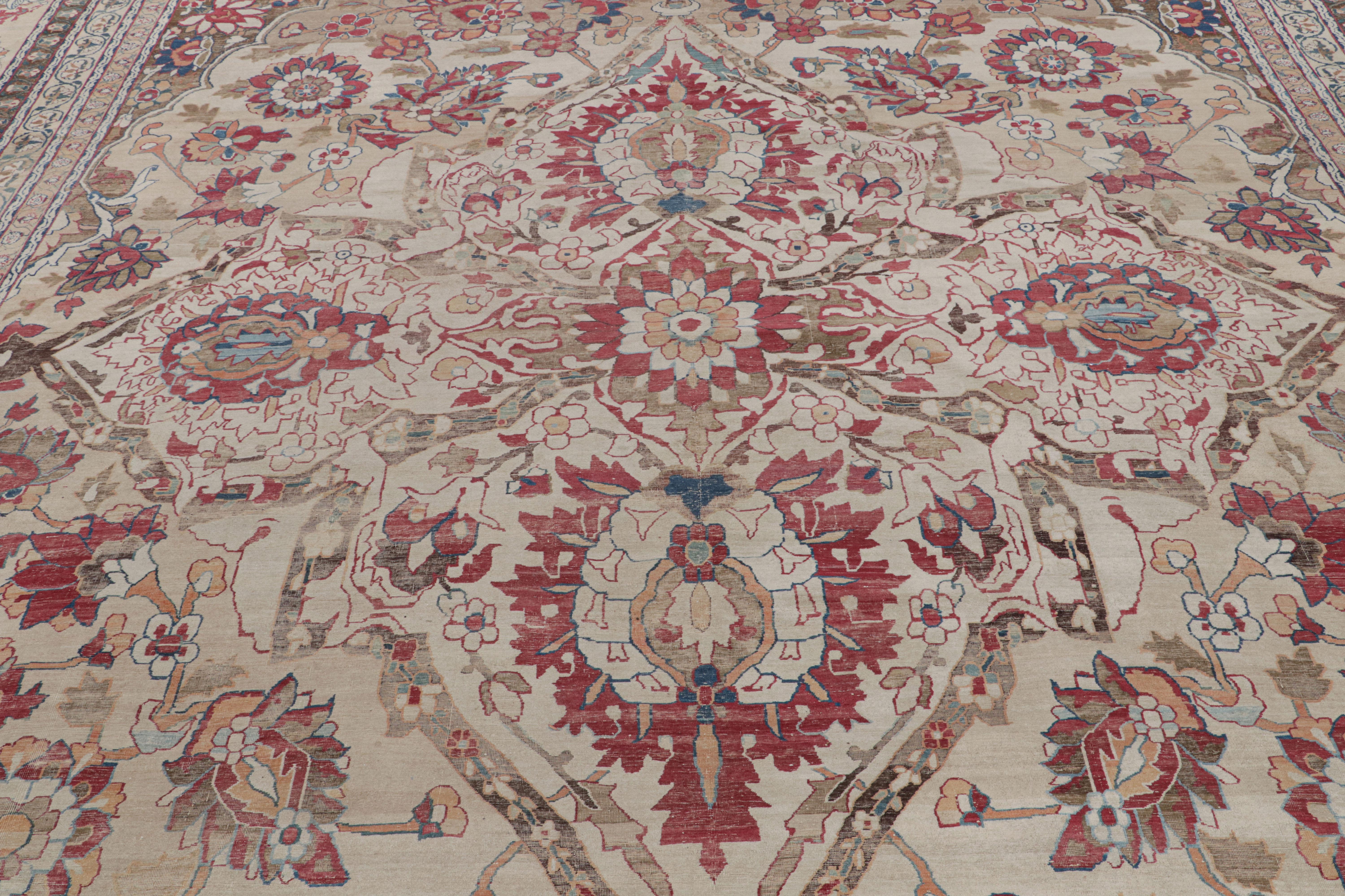 From our antique collection, this 13x19 oversized rug is a rare antique Persian rug of Kermanshah provenance—hand-knotted in wool circa 1890-1900.

On the Design

Beige-brown and red tones underscore floral patterns in the all over style. Keen eyes