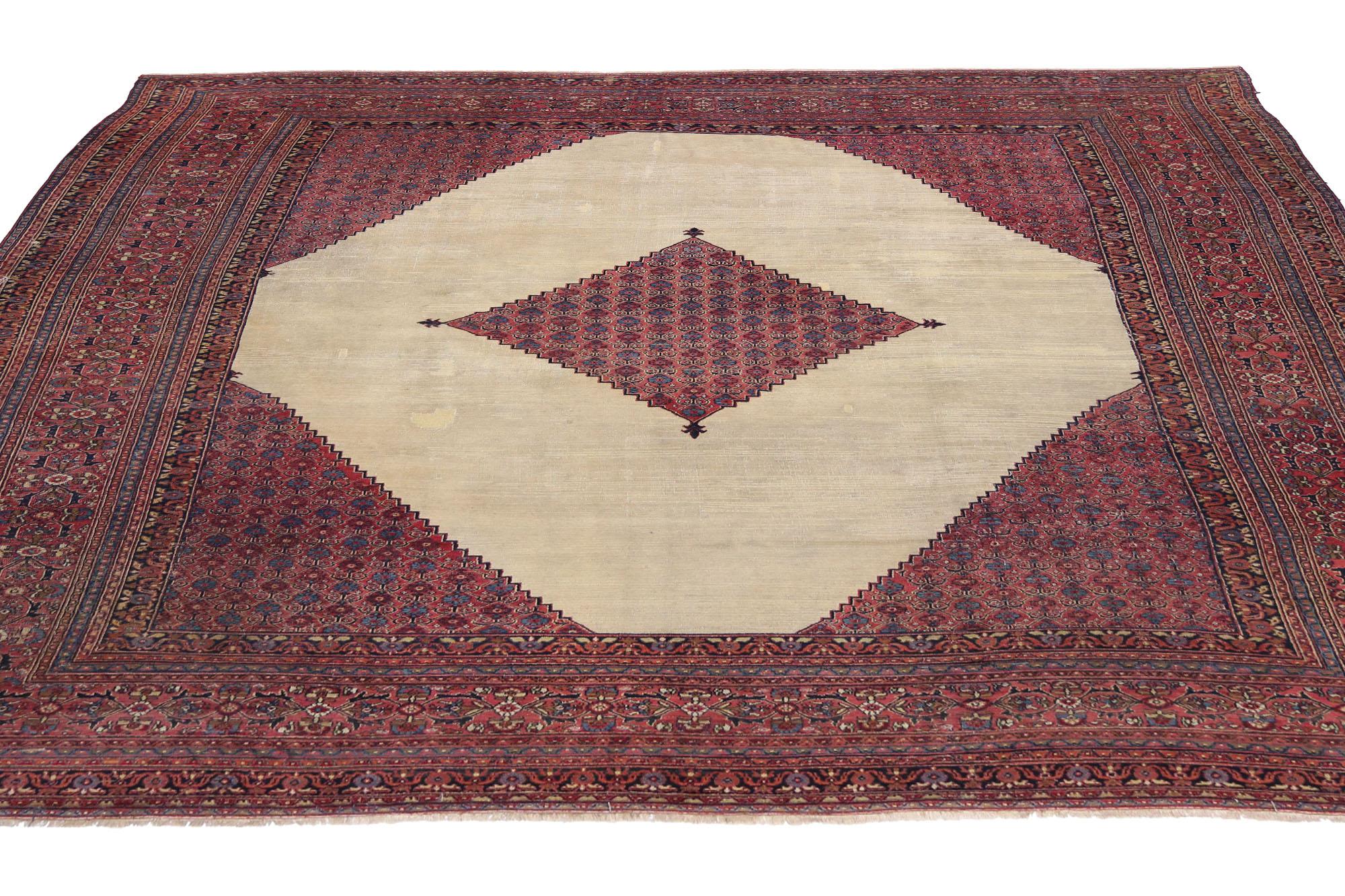 74232 Antique Persian Khorassan Rug Hotel Lobby Size Carpet 13'09 x 15'09.
Timeless design and effortless beauty with rustic sensibility, this hand knotted wool antique Persian Khorassan rug is poised to impress. The geometric botanical design and