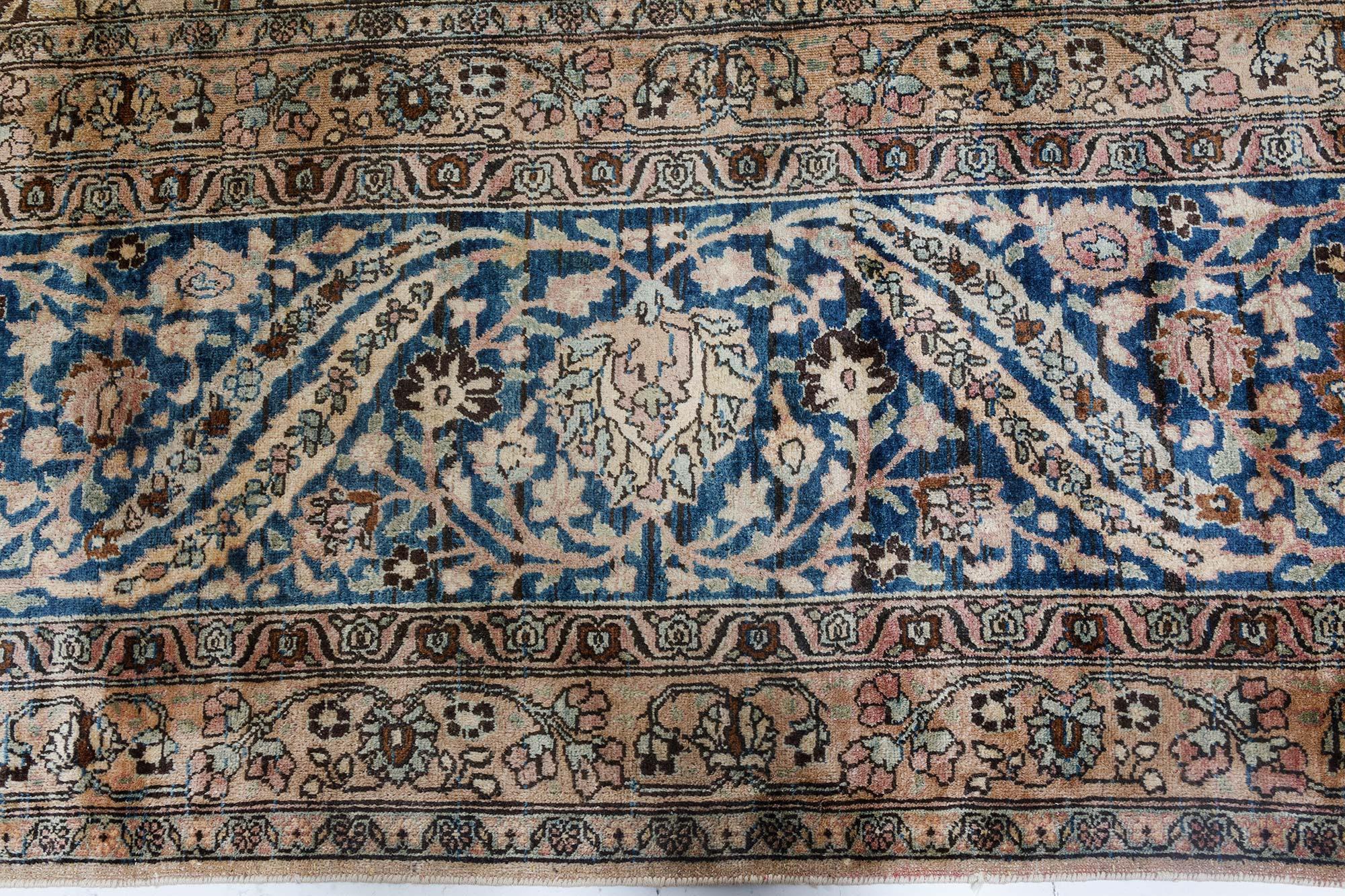 Wool Oversized Antique Persian Kirman Rug Size Adjusted For Sale