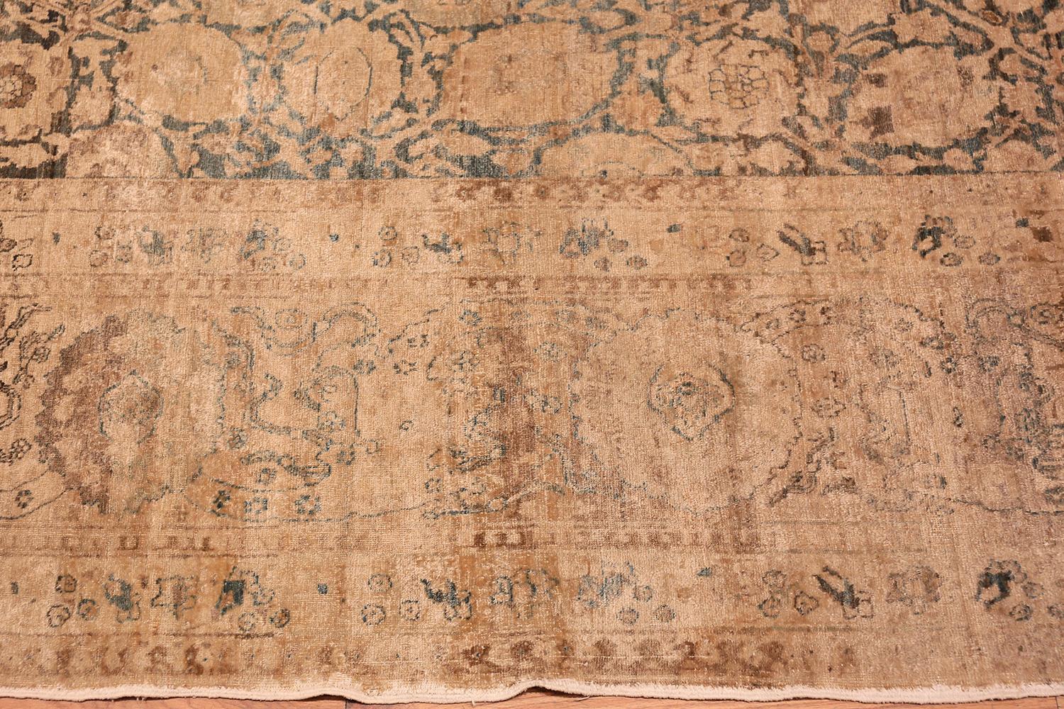 A beautiful and finely woven oversized antique Tabriz carpet that features the iconic Persian vase design, country of origin / rug type: Persian rugs, date circa 1910, size: 12 ft. 2 in x 20 ft. 2 in (3.71 m x 6.15 m).