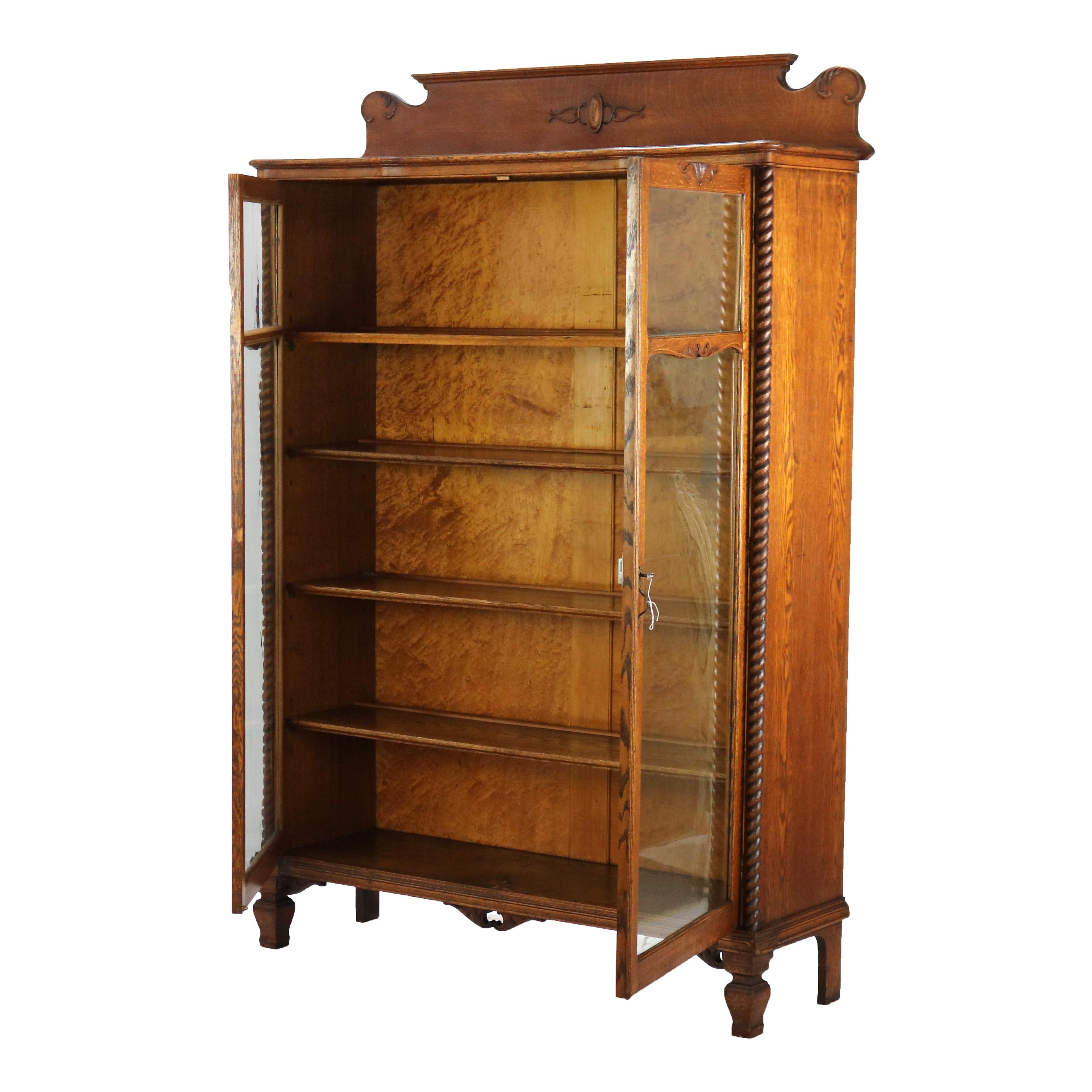 ***Reduced Delivery Rates - See Below or Click “Ask The Seller” to Request a Quote***

Oversized Antique RJ Horner Carved Oak Two Door Bookcase with Rope Twist Columns and Stylized Turnip Feet, C1920

Measures - 67