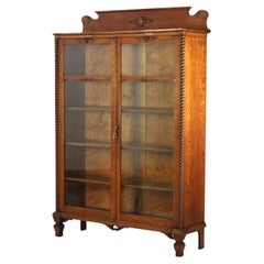 Librería antigua sobredimensionada de dos puertas de roble tallado RJ Horner C1920