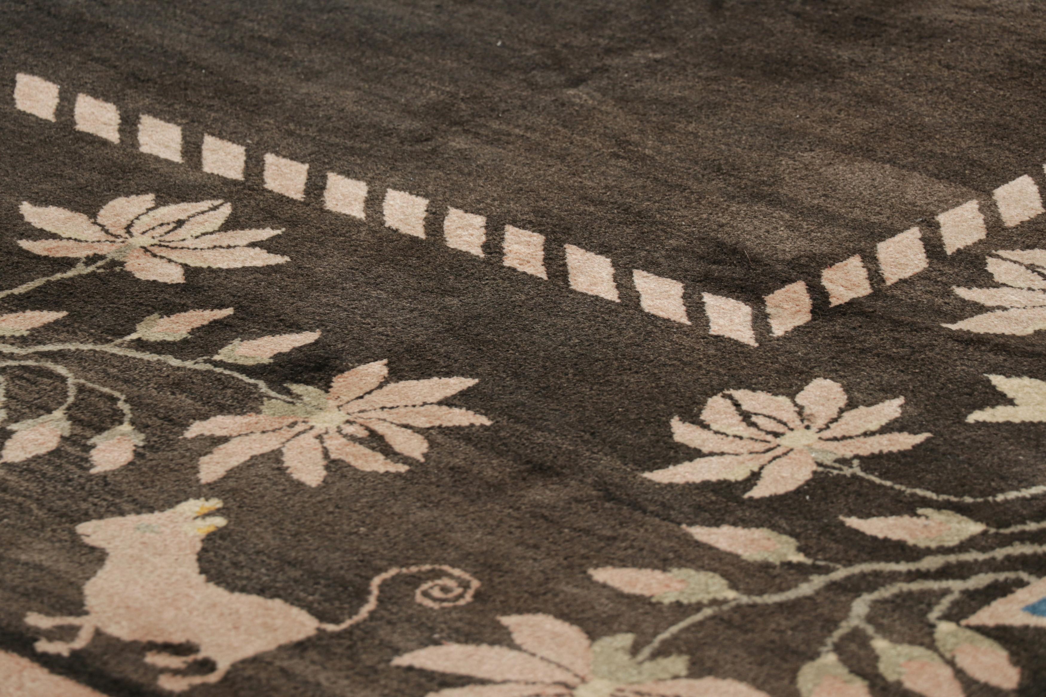 Handknotted in wool and originating in East Turkestan circa 1920-1930, this 14x24 antique Samarkand Rug is among the most exciting new curations from Rug & Kilim’s collection of rare classics. 

On the Design: 

In this piece, a regal deep brown