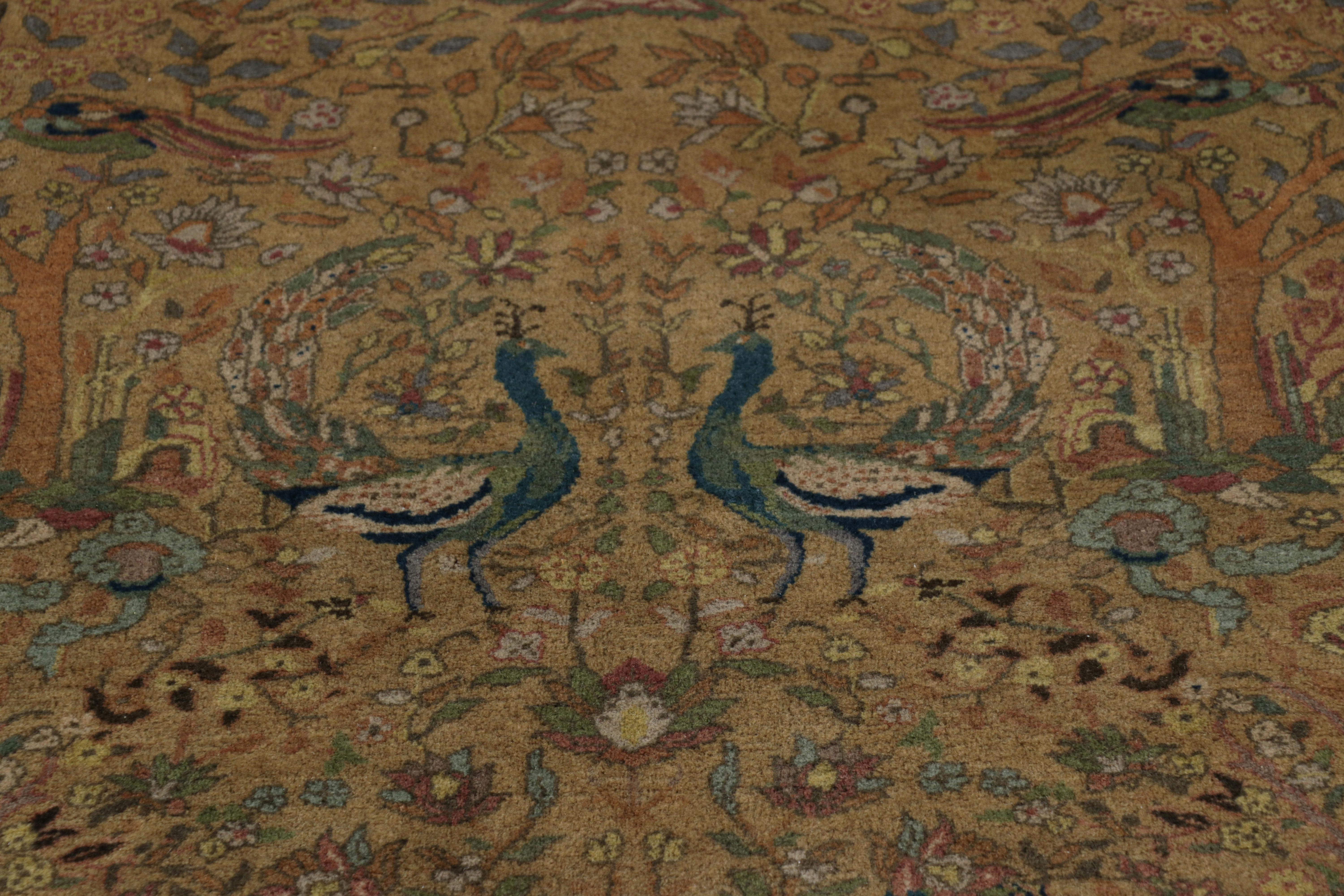 Made with hand-knotted wool circa 1920-1930 from India, this 15x28 antique rug is an interesting Indian interpretation of Persian Tabriz rugs, and a rare oversized rug among the most exciting new curations from Rug & Kilim.

On the Design: