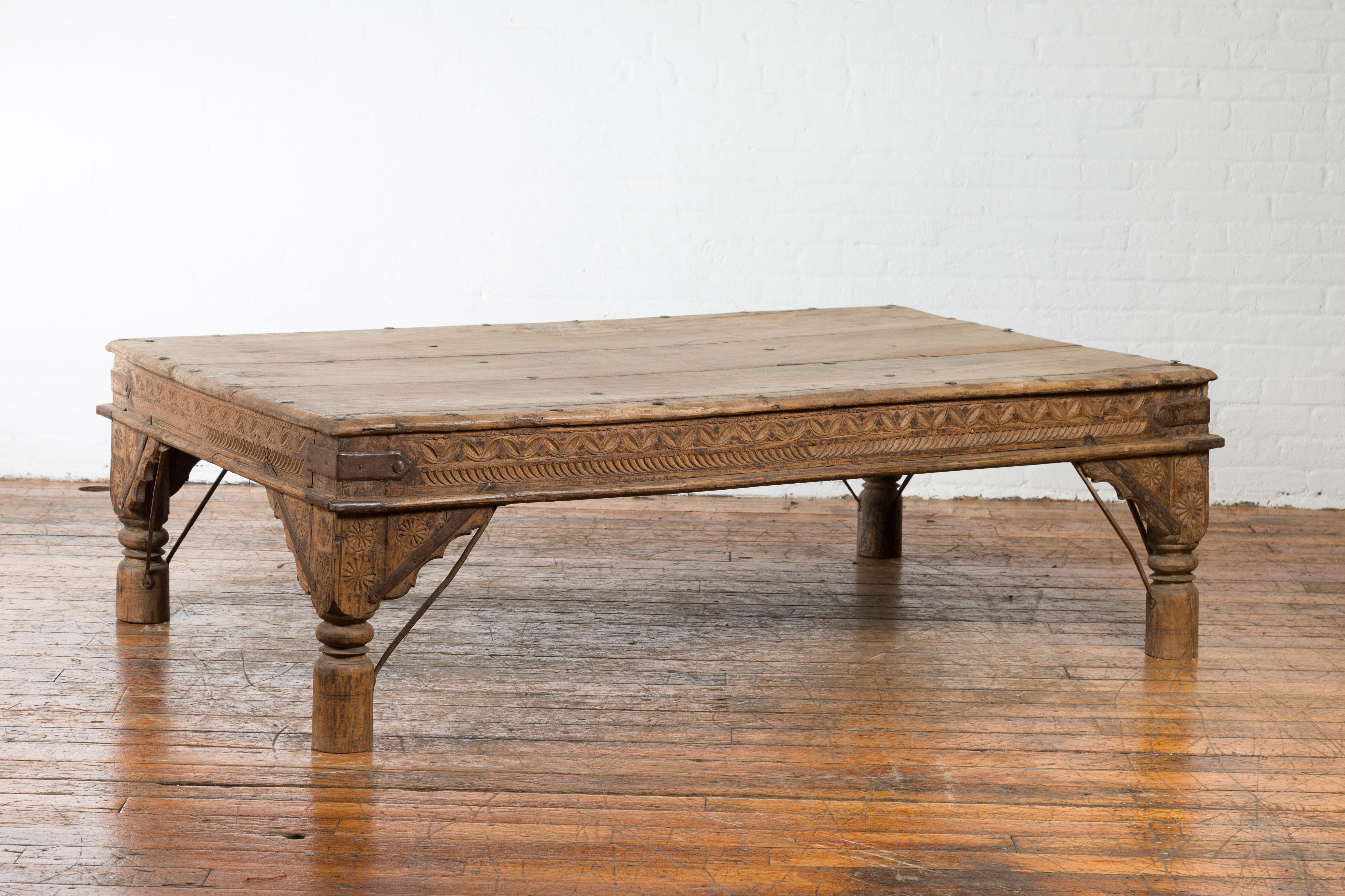 Indian Oversized Antique Temple Door with Studs Made into a Carved Coffee Table