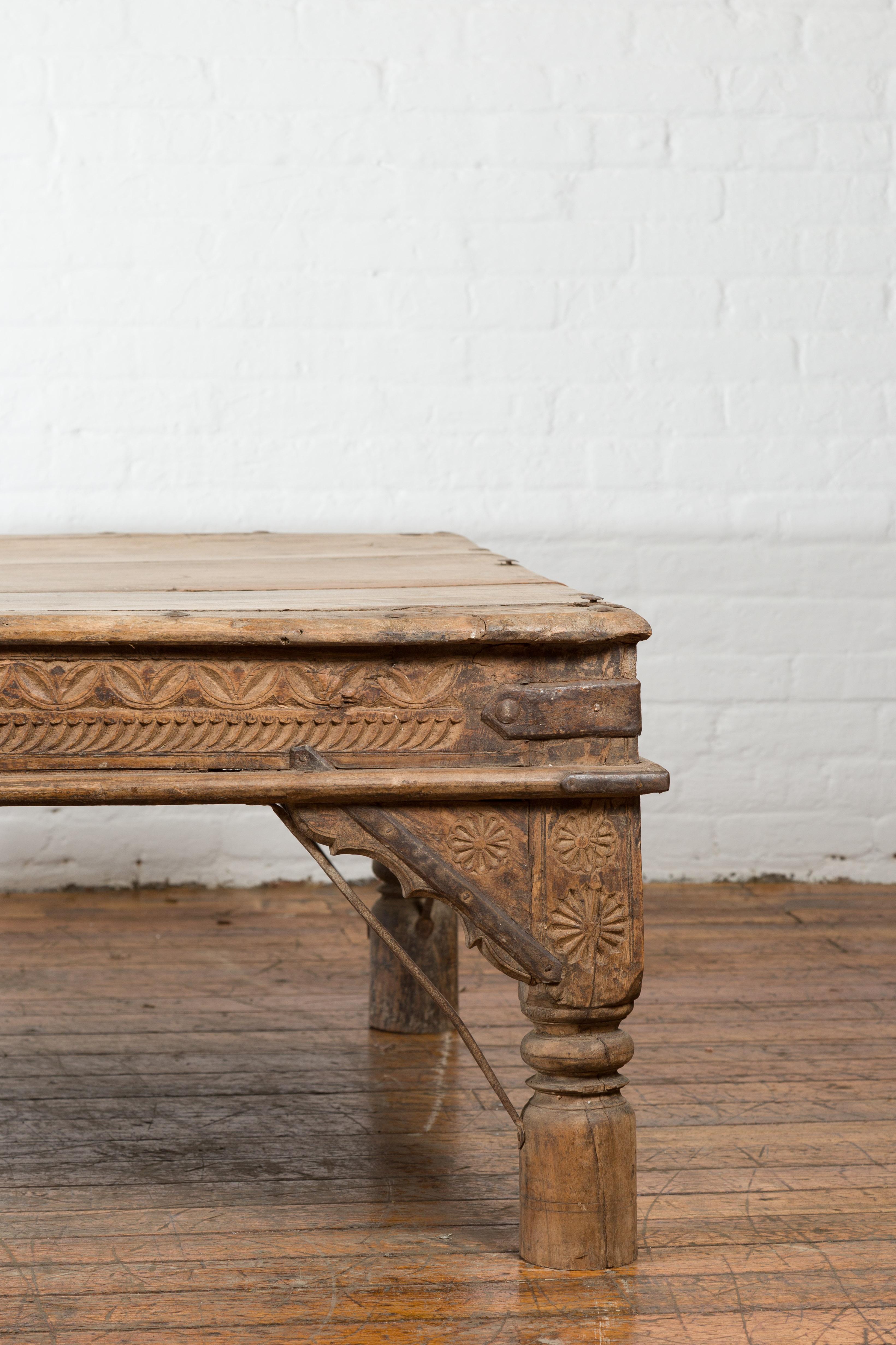 19th Century Oversized Antique Temple Door with Studs Made into a Carved Coffee Table