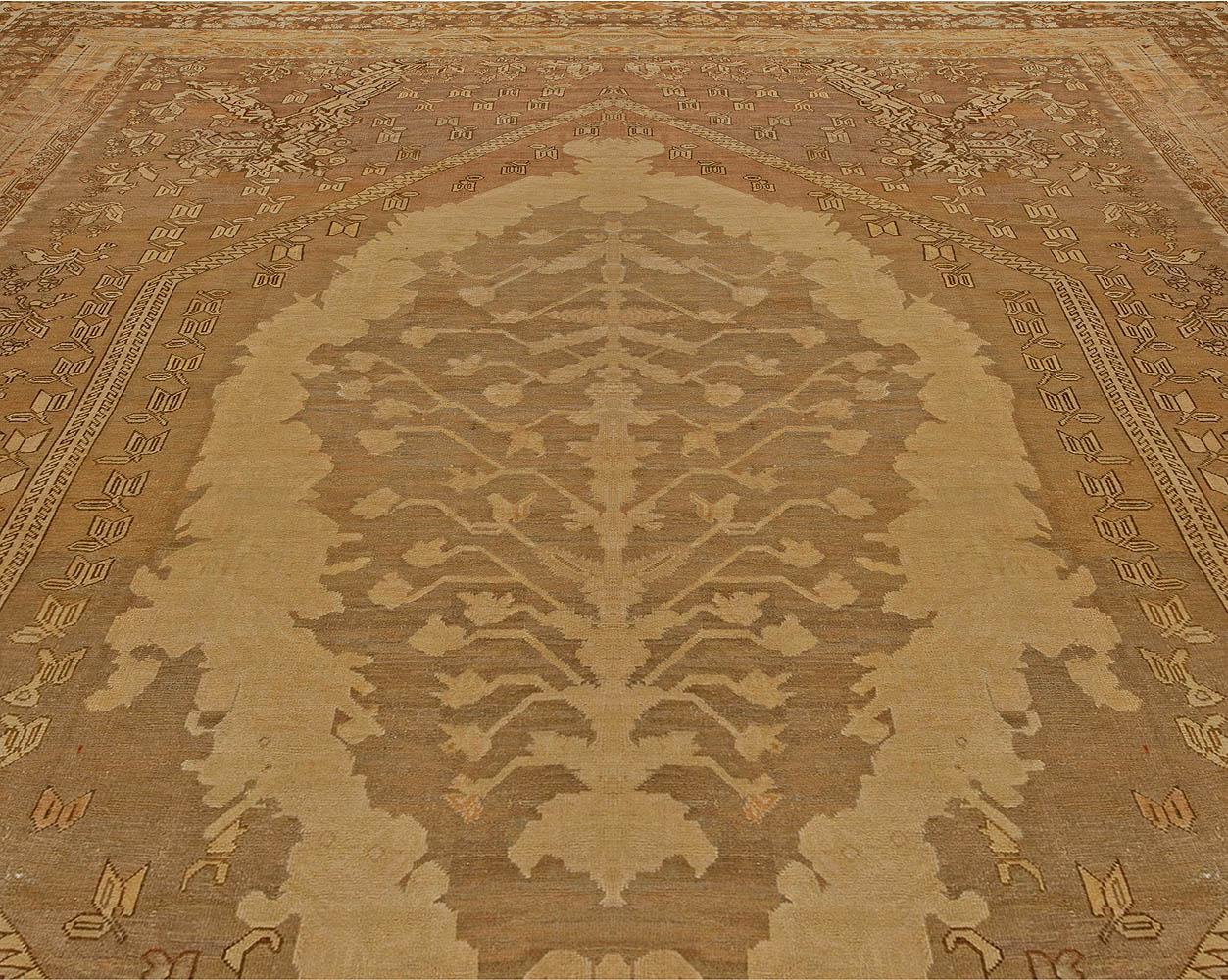 Oversized antique Turkish Ghiordes brown handmade wool rug
Size: 17'6