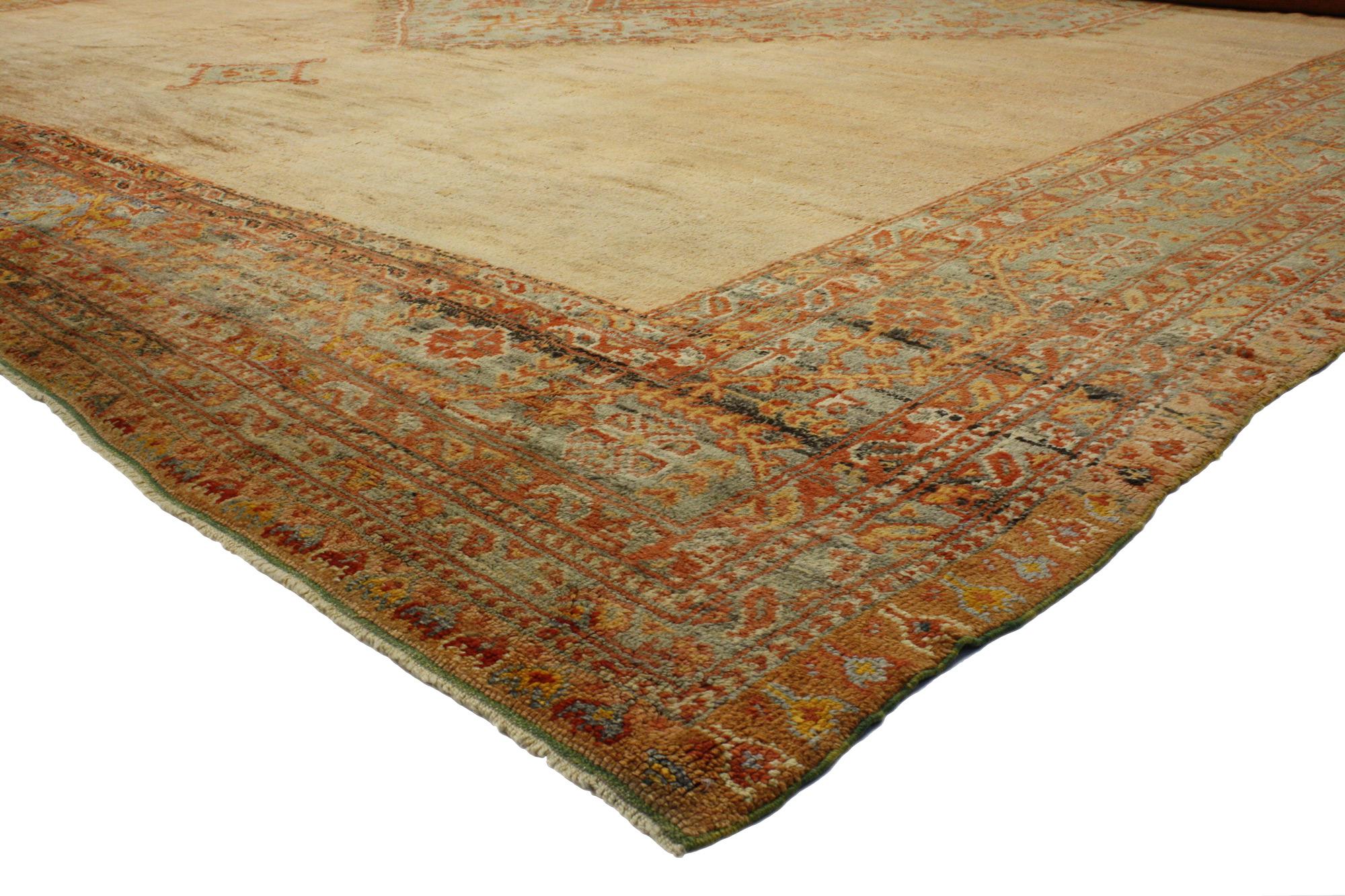 73104 Oversized Antique Turkish Oushak Rug, 17'10 x 20'07. 
Timeless appeal meets Mediterranean style in this hand knotted wool oversized antique Turkish Oushak rug. The ornate details and sunbaked earthy hues woven into this piece work together