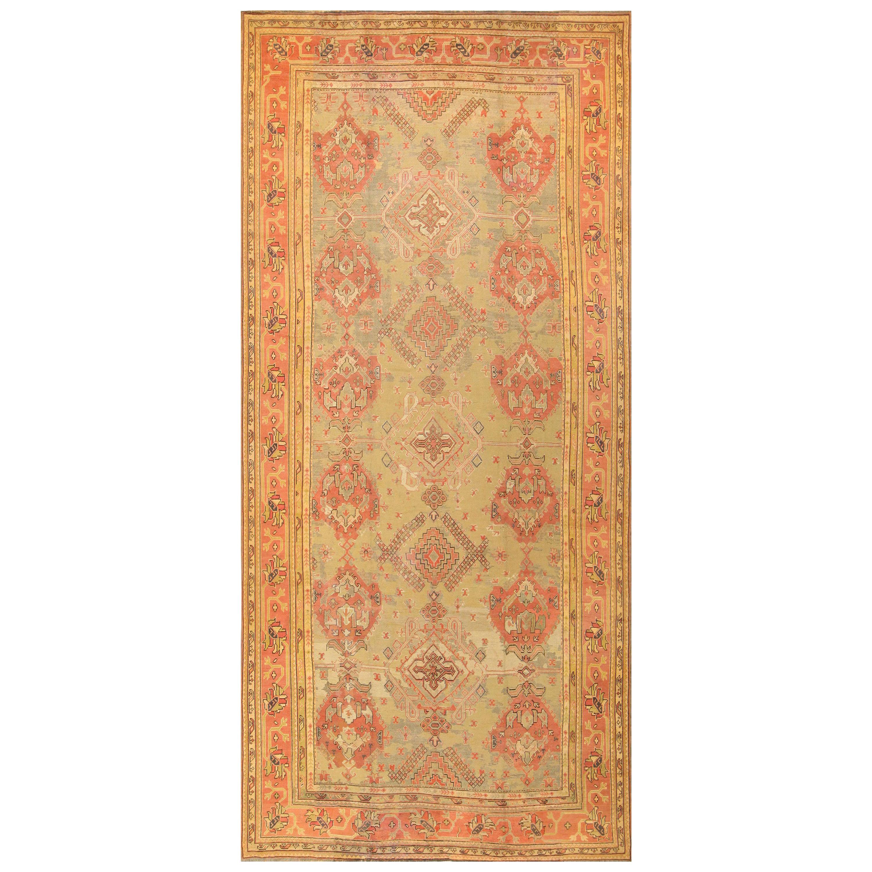 Antique Turkish Oushak Rug. Size: 11 ft 8 in x 25 ft For Sale