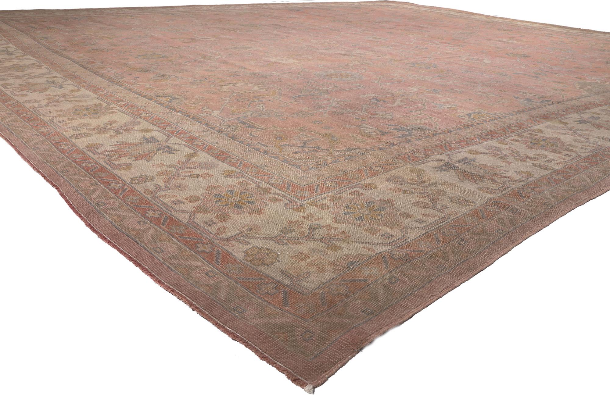77746 Oversized Antique Turkish Oushak Rug, 16'00 x 19'01. 
Softer yet no less striking, this oversized antique Turkish Oushak rug marries romantic style with unmistakable Anatolian imagery to create a truly unique piece. The angular botanical