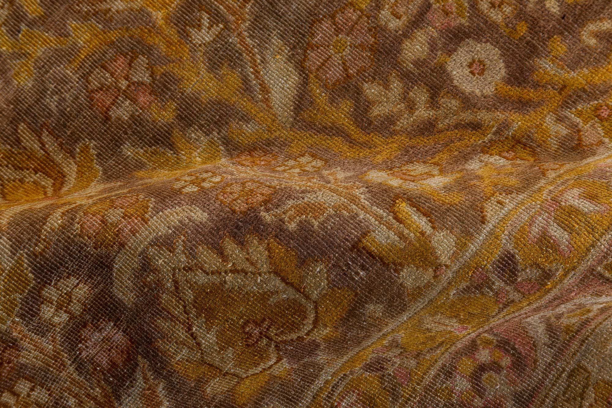 Oversized antique Turkish Sivas brown handmade wool rug
Size: 12'10