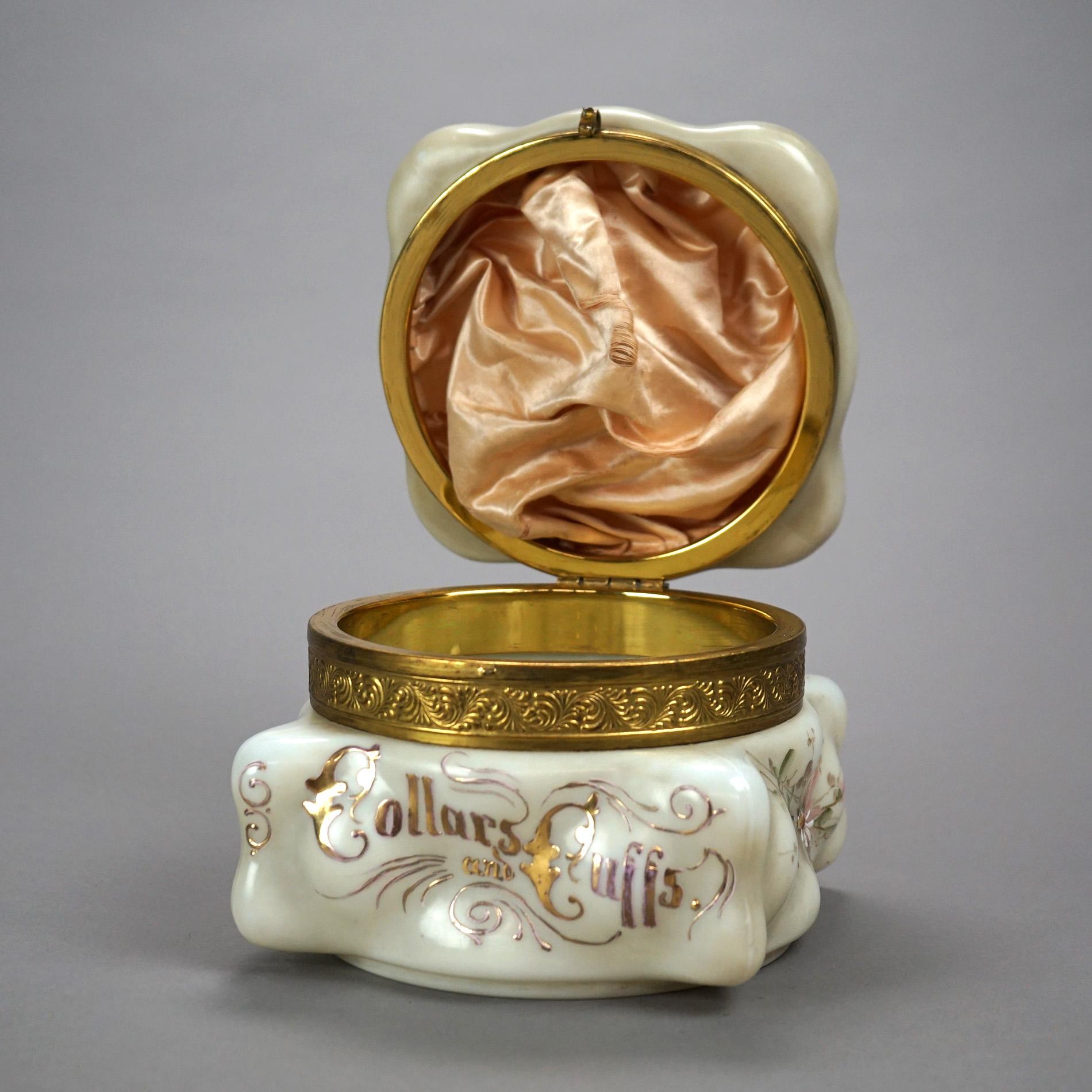 A large antique Victorian dresser box for collars and cuffs by Wavecrest offers glass construction with hand enameled floral decoration and gilt lettering, c1890

Measures- 6''H x 6.5''W x 6.5''D.