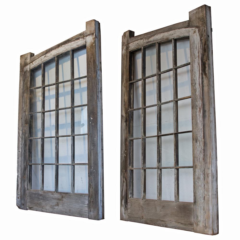 Salvaged from an east coast armory, these oversized windows are well weathered statement pieces.