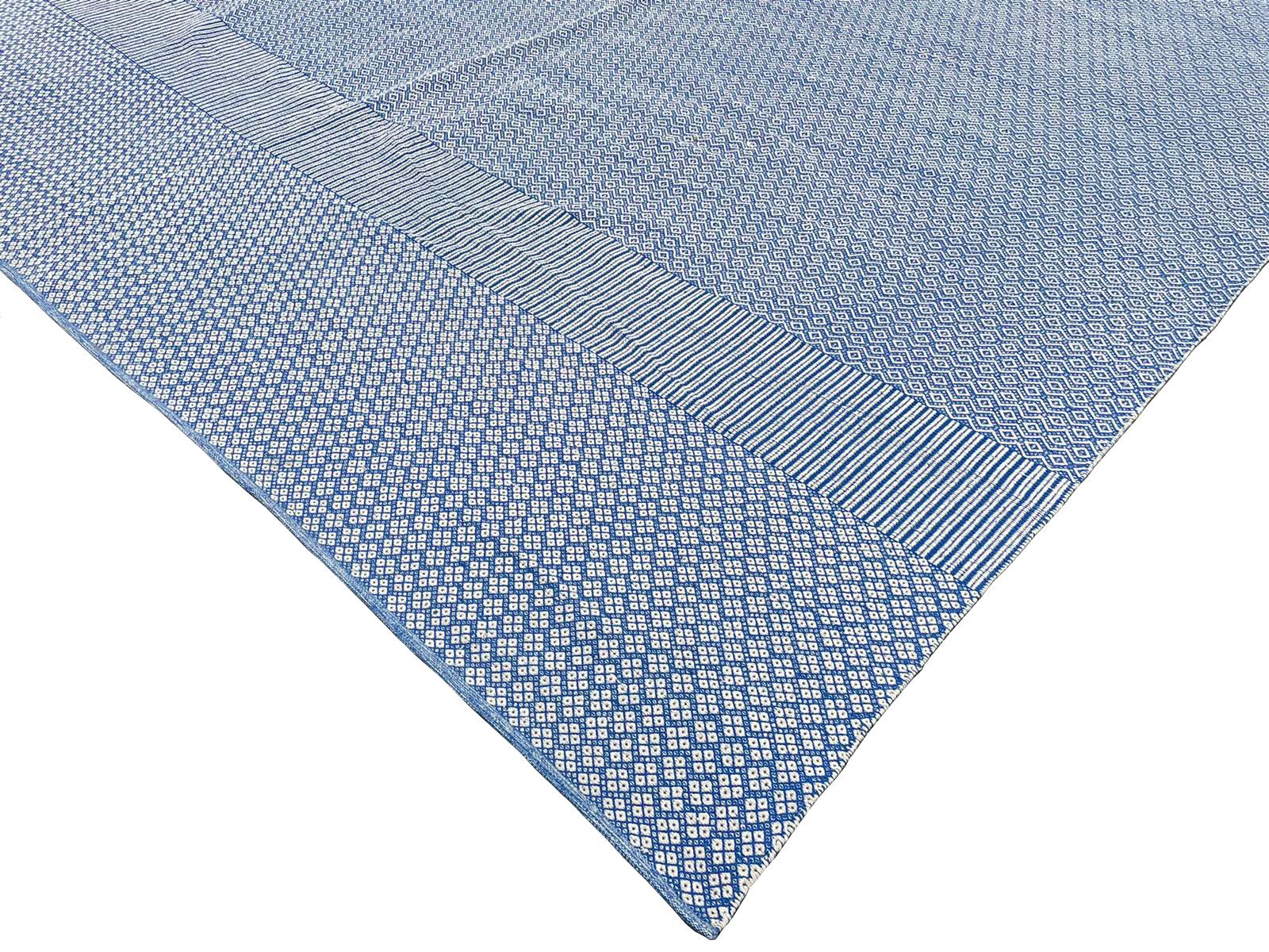 Beautiful Pristine blue flat-weave rug. Handmade in India in a size 18 x 16 feet.
