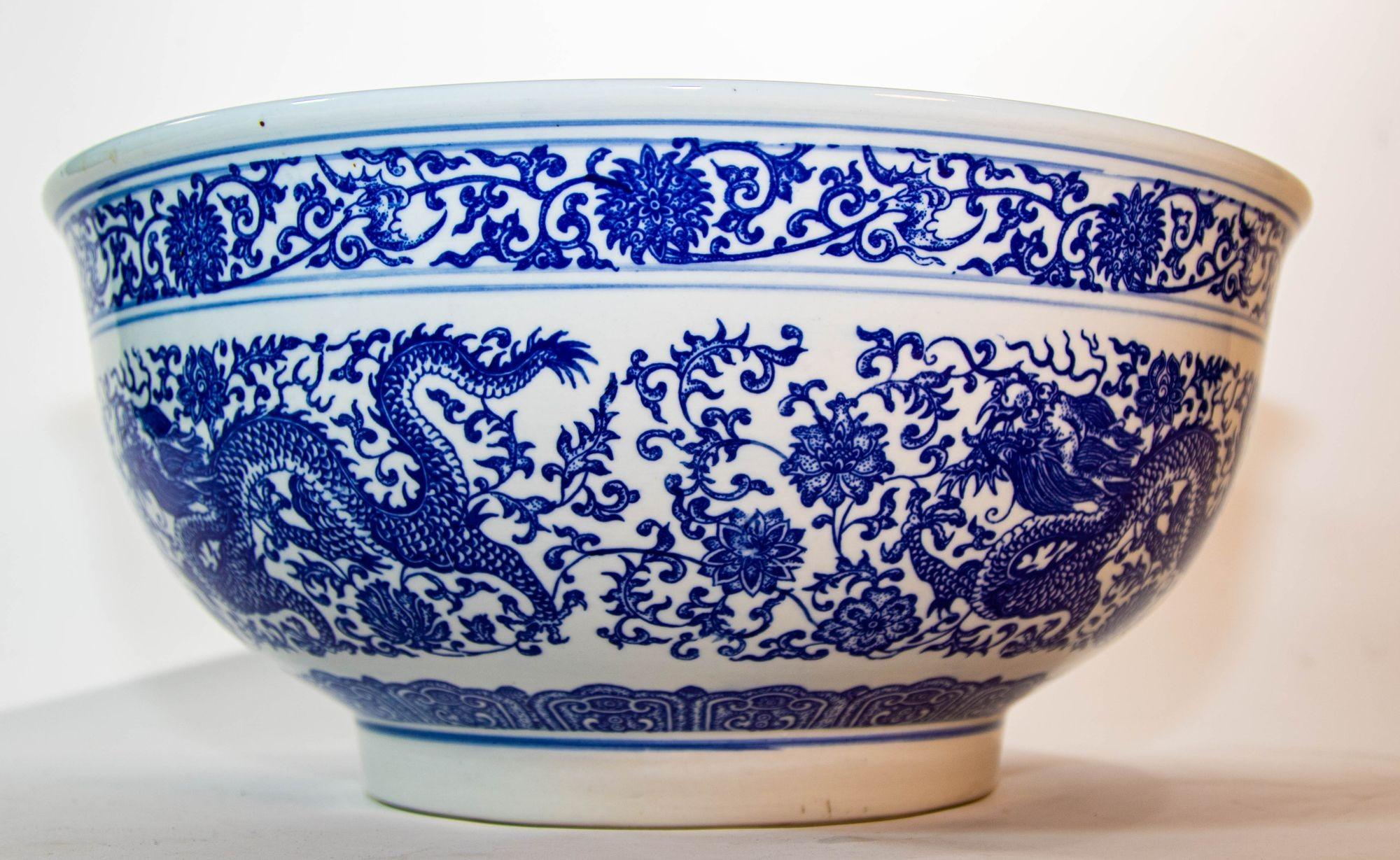 Chinoiserie Oversized Blue and White Porcelain Chinese Dragons Bowl 16 in. D. Circa 1950s