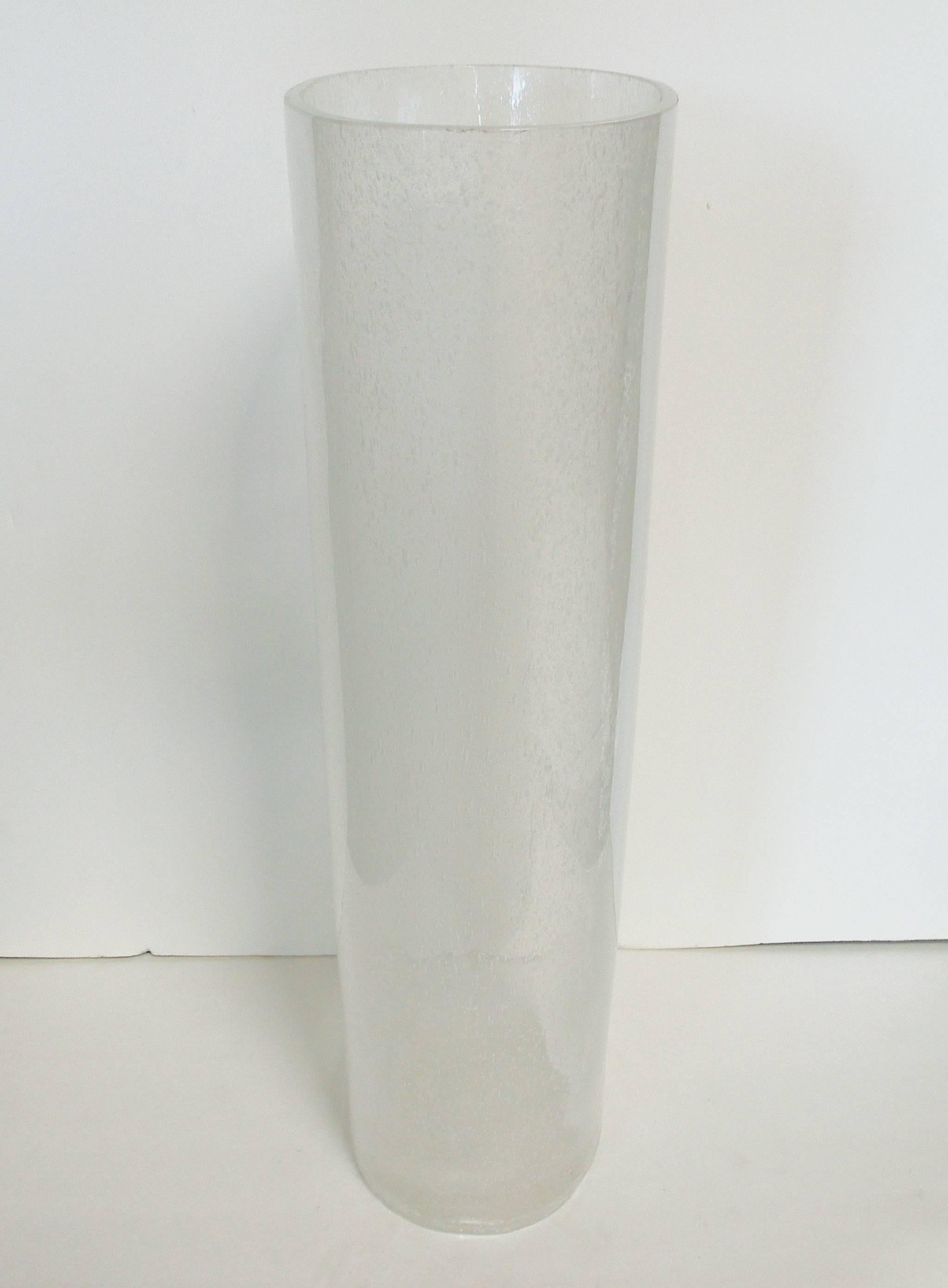 Vintage Italian oversized clear Murano glass vase hand blown in Bollicine technique, bubbles within the glass, made in Italy in the 1960s
Measures: Height 24.5 inches, depth 7.5 inches, width 11.5 inches
2 in stock in Palm Springs currently ON 40%