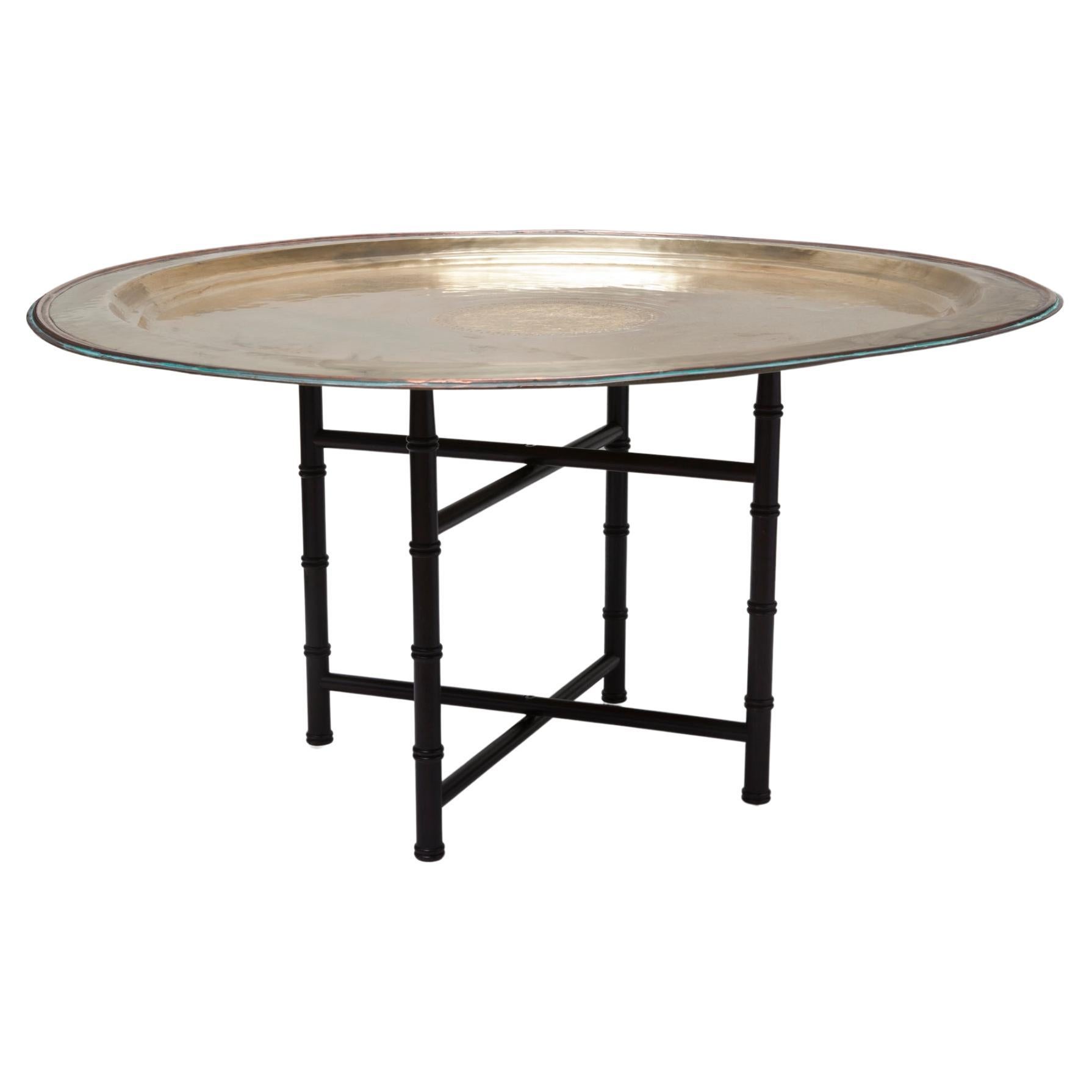 Oversized vintage mid-century brass tray table on ebony folding base.
Table base is 14
