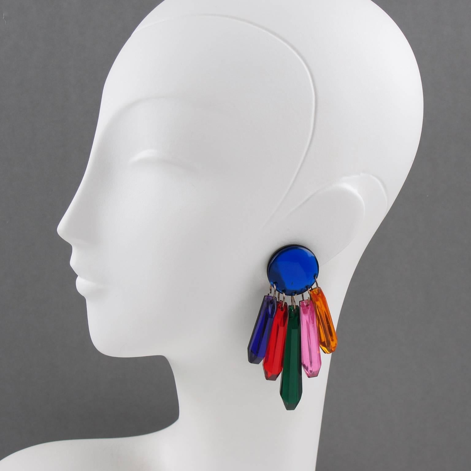 Stunning Italian designer studio oversized dangling chandelier Lucite clip on earrings. Huge dimensional shape with geometric dangling drop charms with mirror texture pattern. Assorted colors of cobalt blue, purple, bright red, forest green, pink