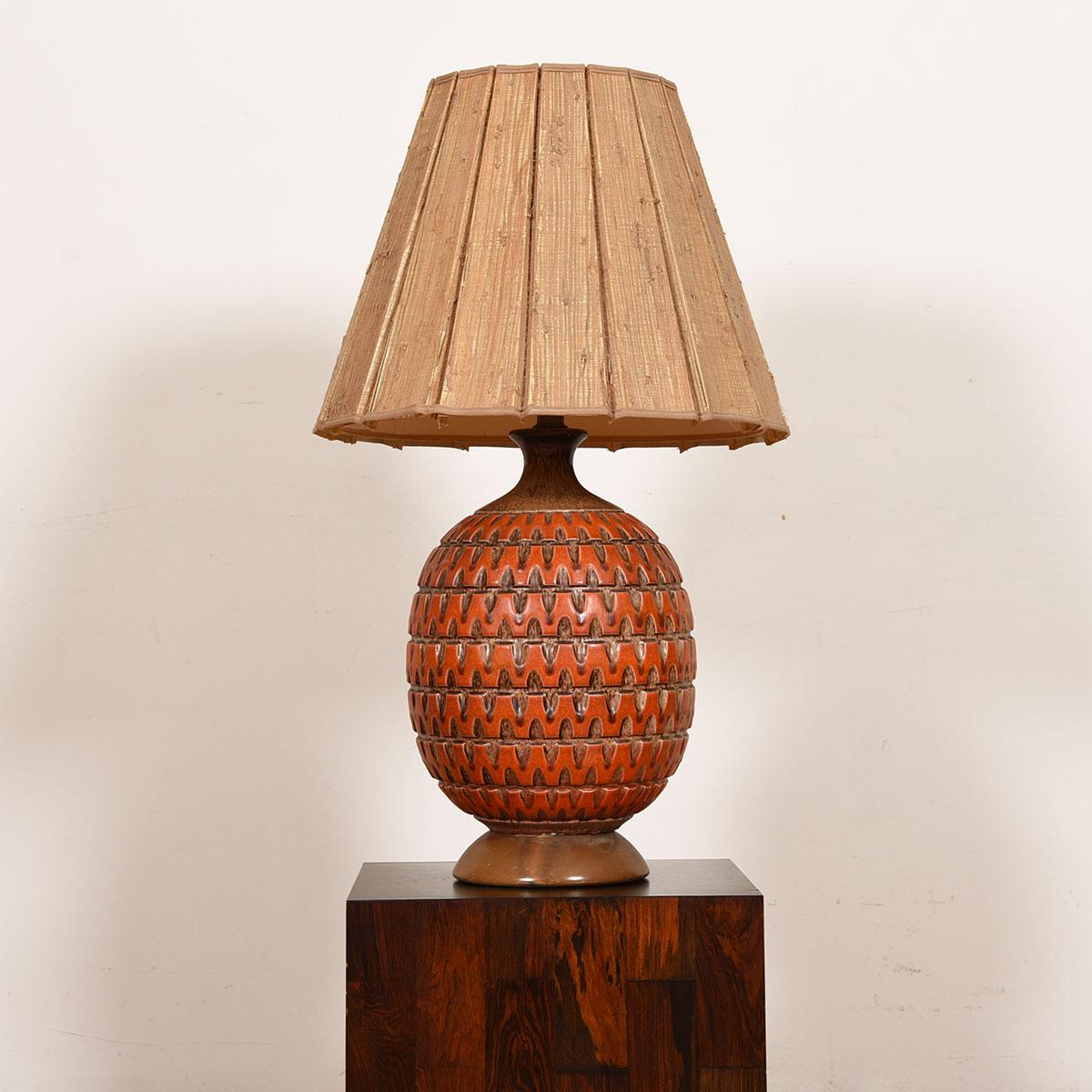 Oversized Decorator Lamp in Burnt Orange with Great Texture & Presence

Additional information:
Material: Walnut
Featured at Kensington:
Fun, oversized MCM Lamp in Burnt Orange.
Place it in your room to add texture and presence.
Zigzag