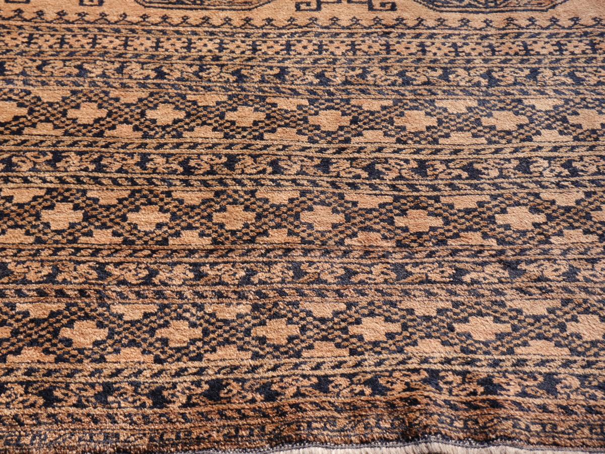 Large oversized tribal rug Afghan Ersari Turkoman or Turkmen rug

The Turkmen or Turkoman people are settling in villages in Afghanistan an Turkmenistan near the Persian border. Their origin is tribal nomadic, but most members of the tribes have