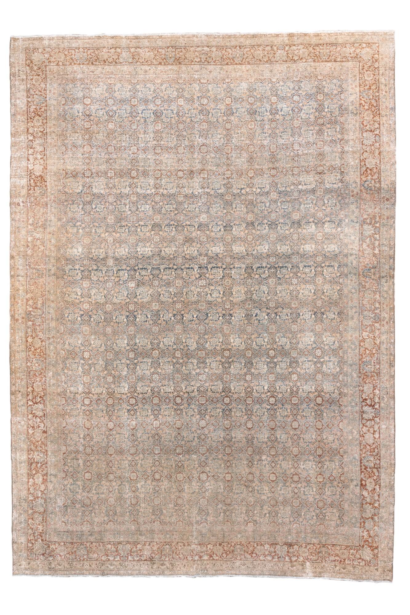 An extraordinary oversized Persian Bidjar rug, hand-knotted with a mesmerizing allover Herati pattern rendered in a soft gradient of rust, powder blue, ivory, and charcoal gray. This rug showcases the classic Bidjar density—famously dubbed the “Iron