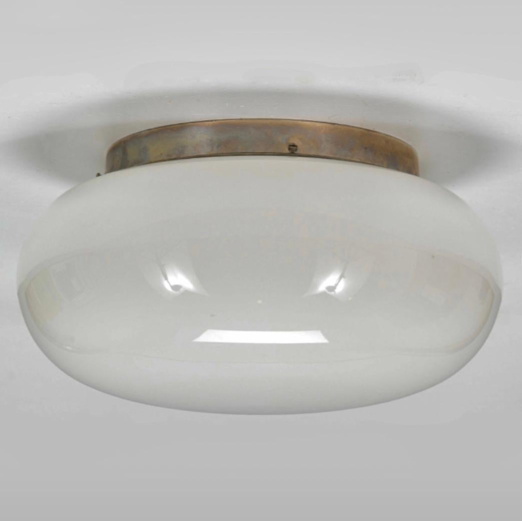 Mid-20th Century Oversized flush mount lighting  by Paavo Tynell / 2 available.