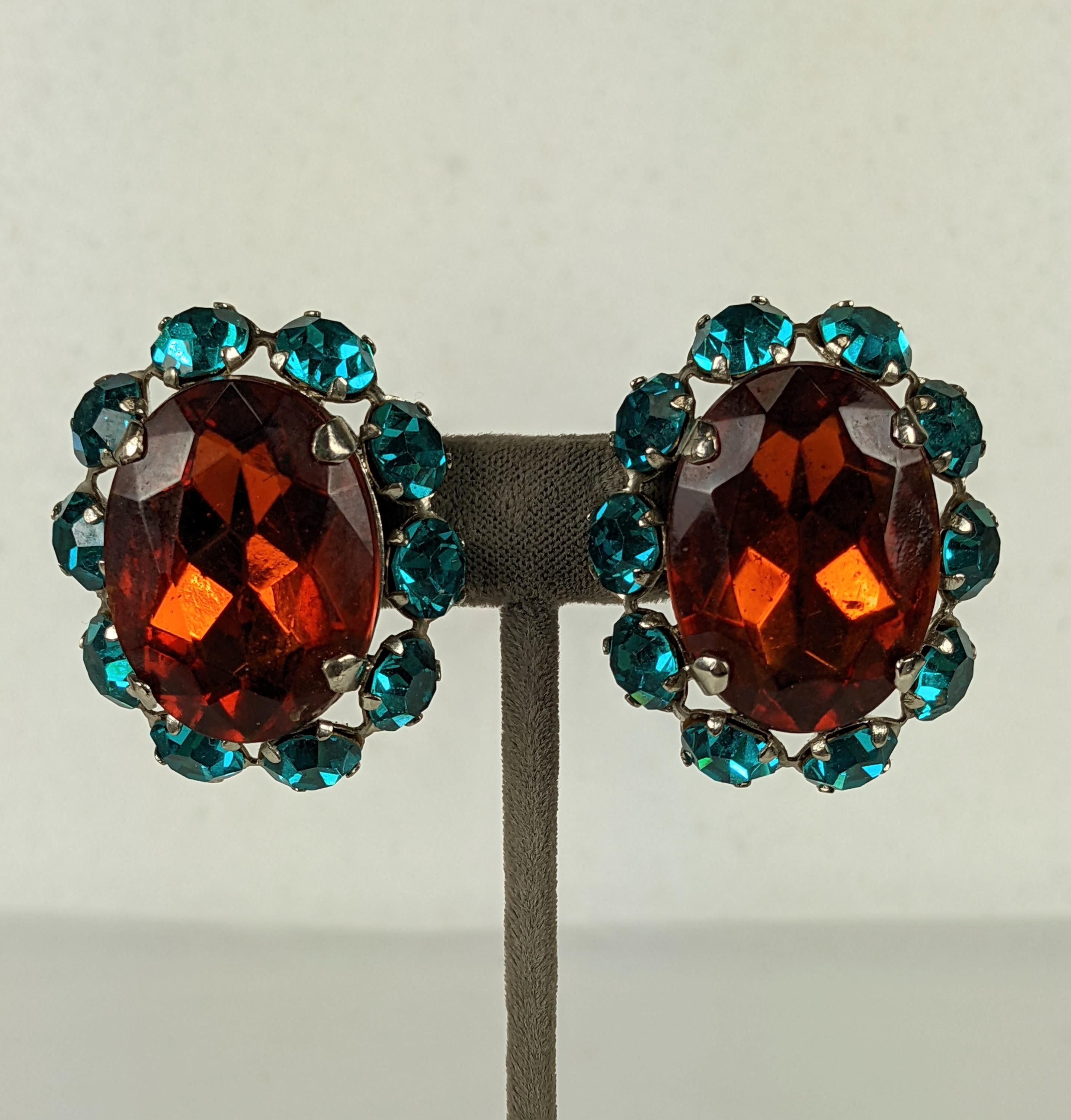 Oversized French Crystal Earrings likely made for YSL runway, but unsigned. Large and dimensional with clip back fittings. Aqua and Topaz pastes. 1980's France.
1.75