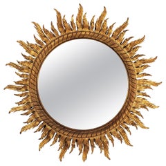 Oversized Gilt Sunburst Mirror in Carved Wood, 52 inches