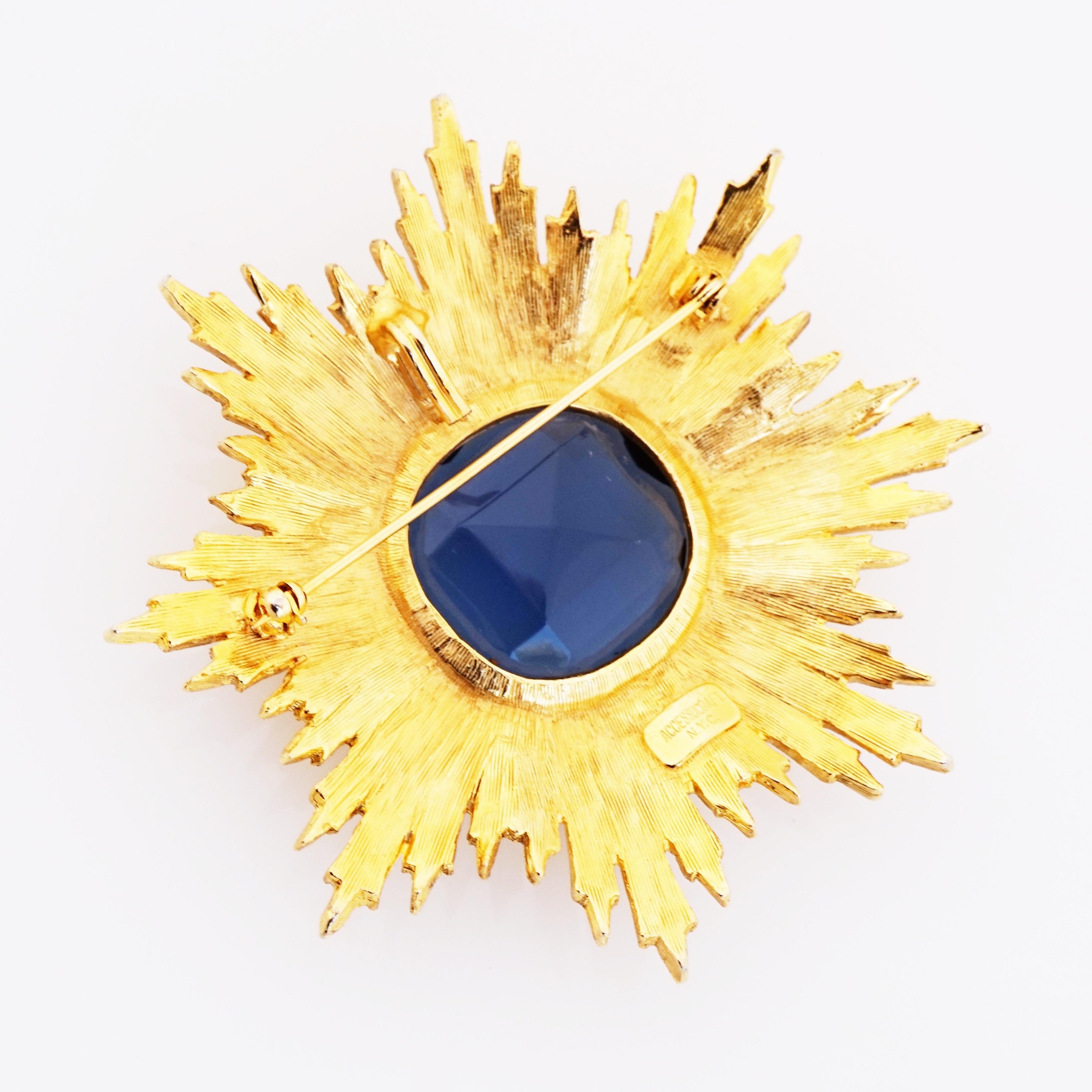 Modern Oversized Gold Sunburst Brooch With Blue Sapphire Crystal By Accessocraft, 1970s