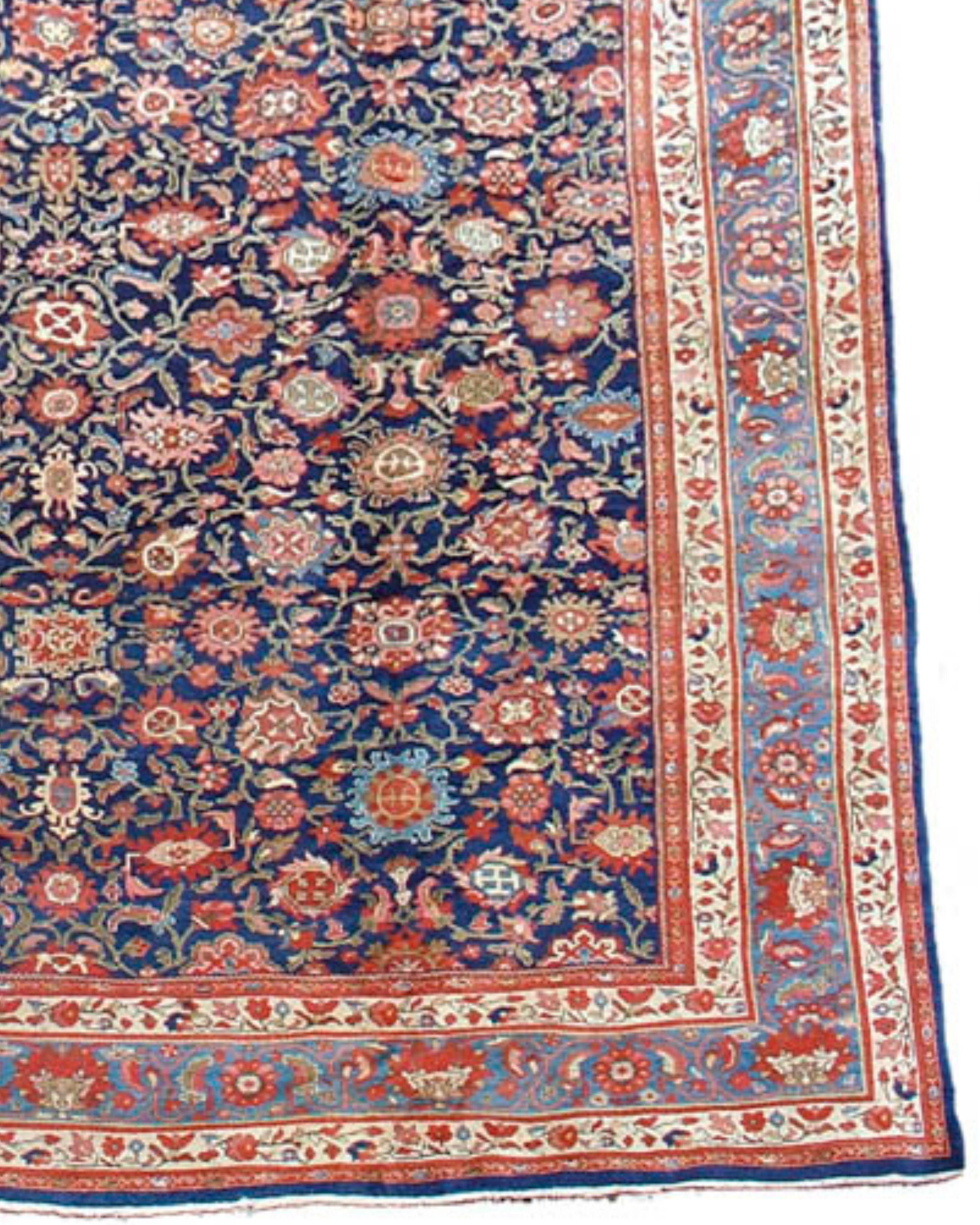 Oversized Persian Hamadan Carpet, Late 19th Century

Large palace-sized Hamadan carpets of this scale are rare and it is probable that this piece was commissioned for a specific purpose or location. The field uses a particularly intriguing variant
