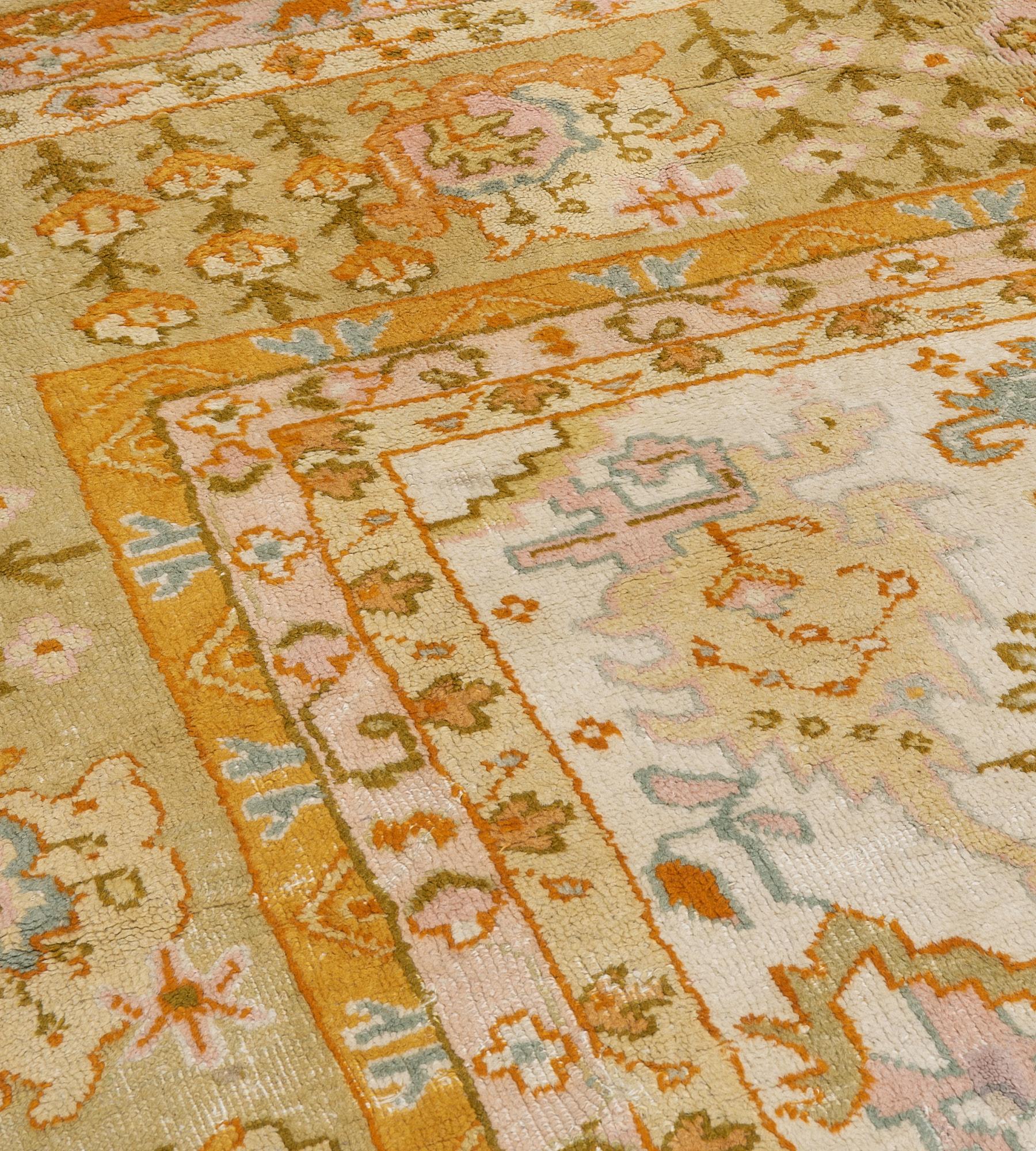 20th Century Oversized Hand-knotted Wool Antique Floral Turkish Oushak Rug For Sale