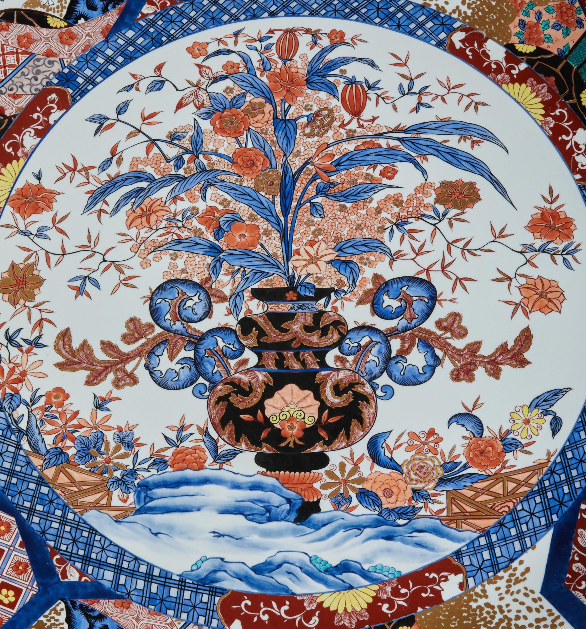 Oversized display item depicting a central floral arrangement design surrounded by cherry trees in bloom and a motif of various patterns. Comes with mounting bracket. The character drawn says: Ju (Kotobuki)