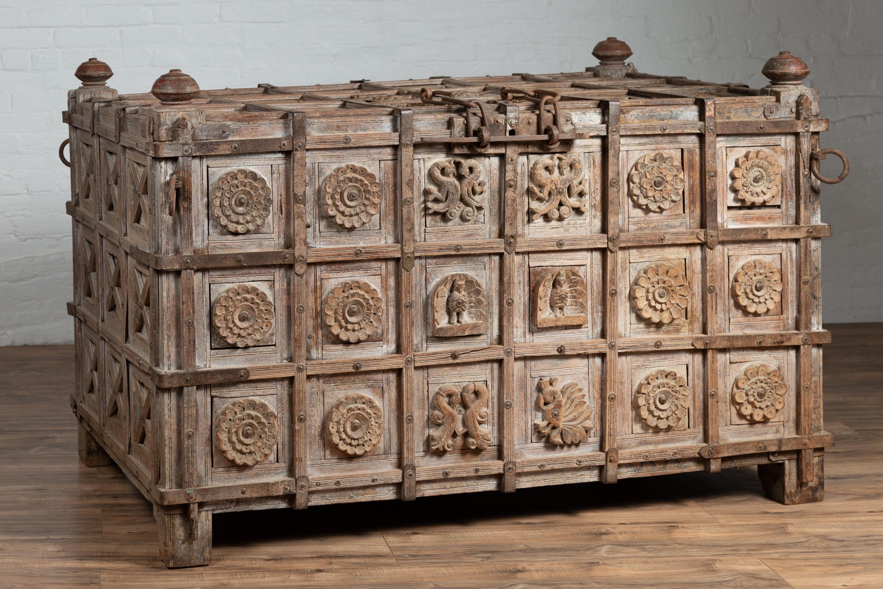 Carved Oversized Indian Treasure Chest with Raised X Patterns, Rosettes and Animals