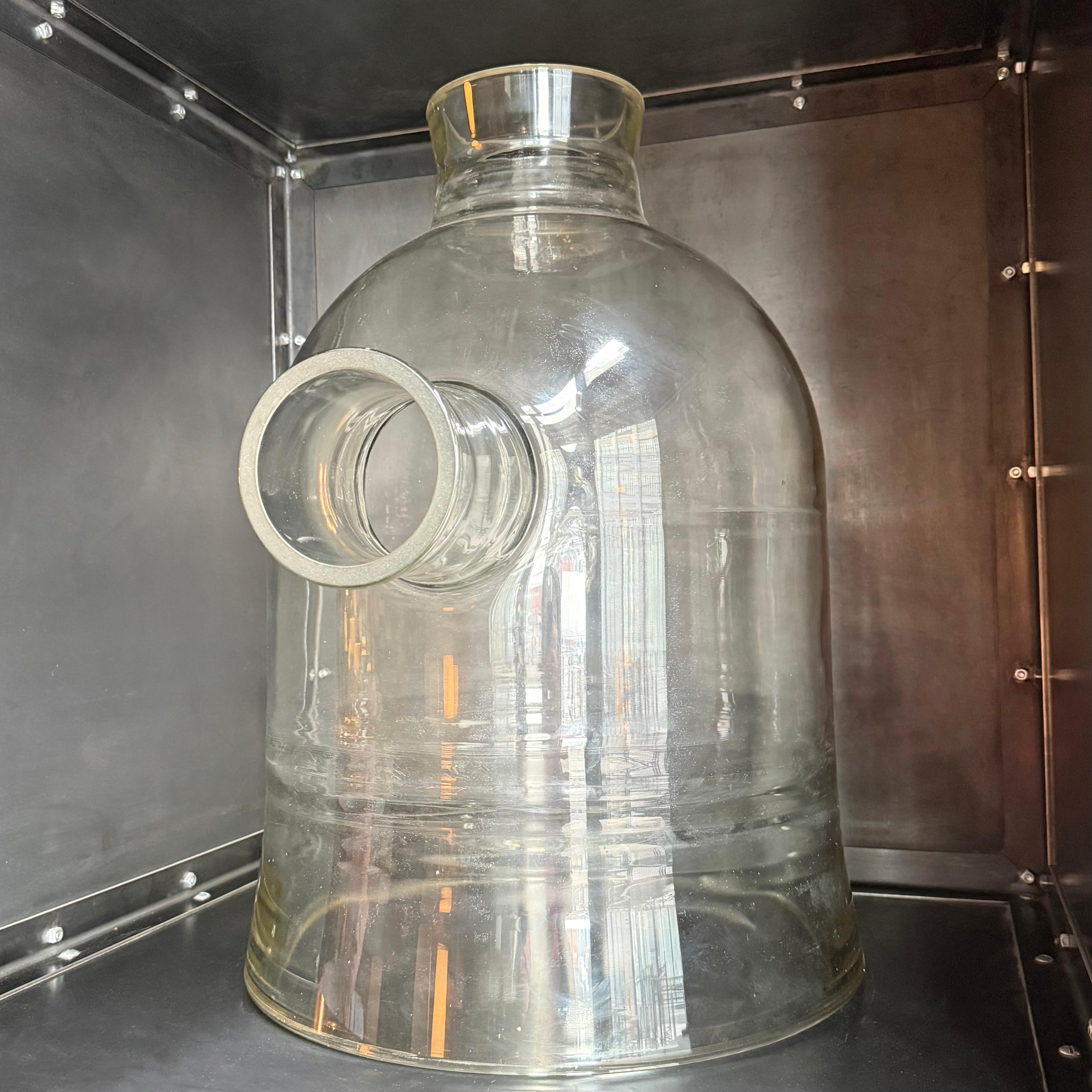This oversized Industrial Pyrex glass bell jar is certainly a unique and an impressive art object. At 29