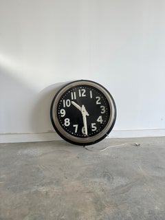 Oversized light-up antique factory wall clock