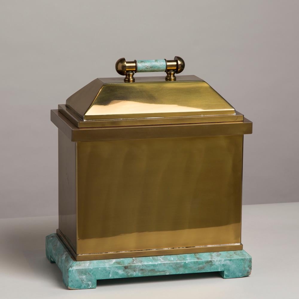 Over sized brass box set on a simulated green stone base and with a stone handle designed by Lorin Marsh, 1970s.